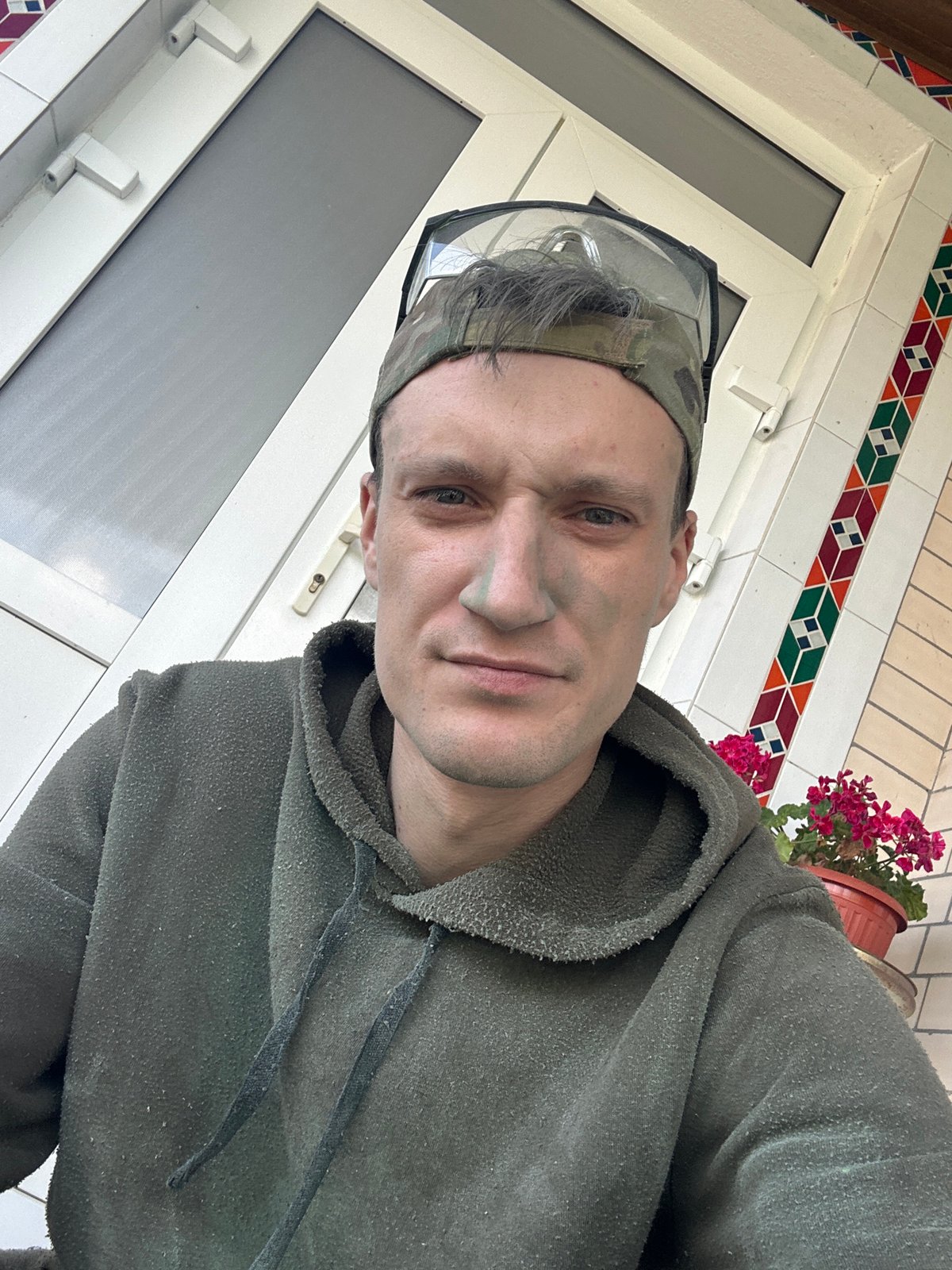 Selfie series in Makiv: camo gear, safety glasses, green face paint