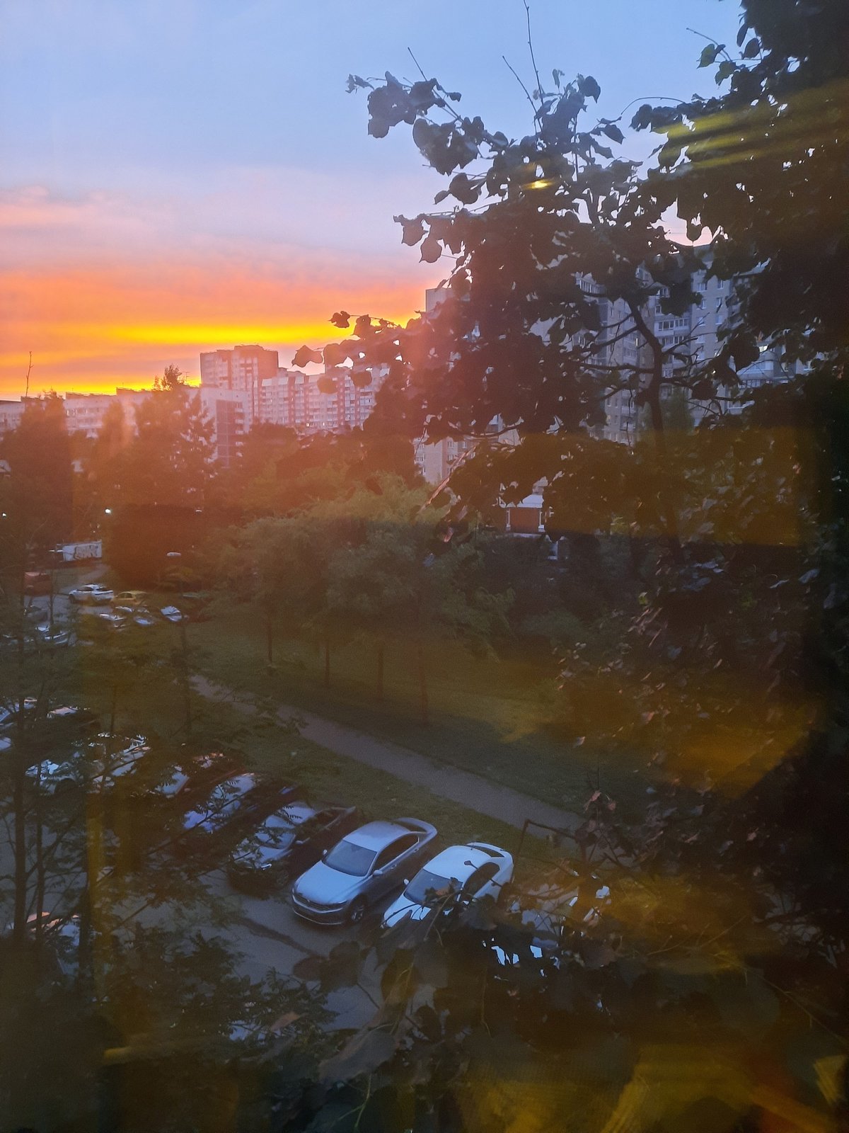 St. Petersburg skyline glows at dusk, orange fading to purple