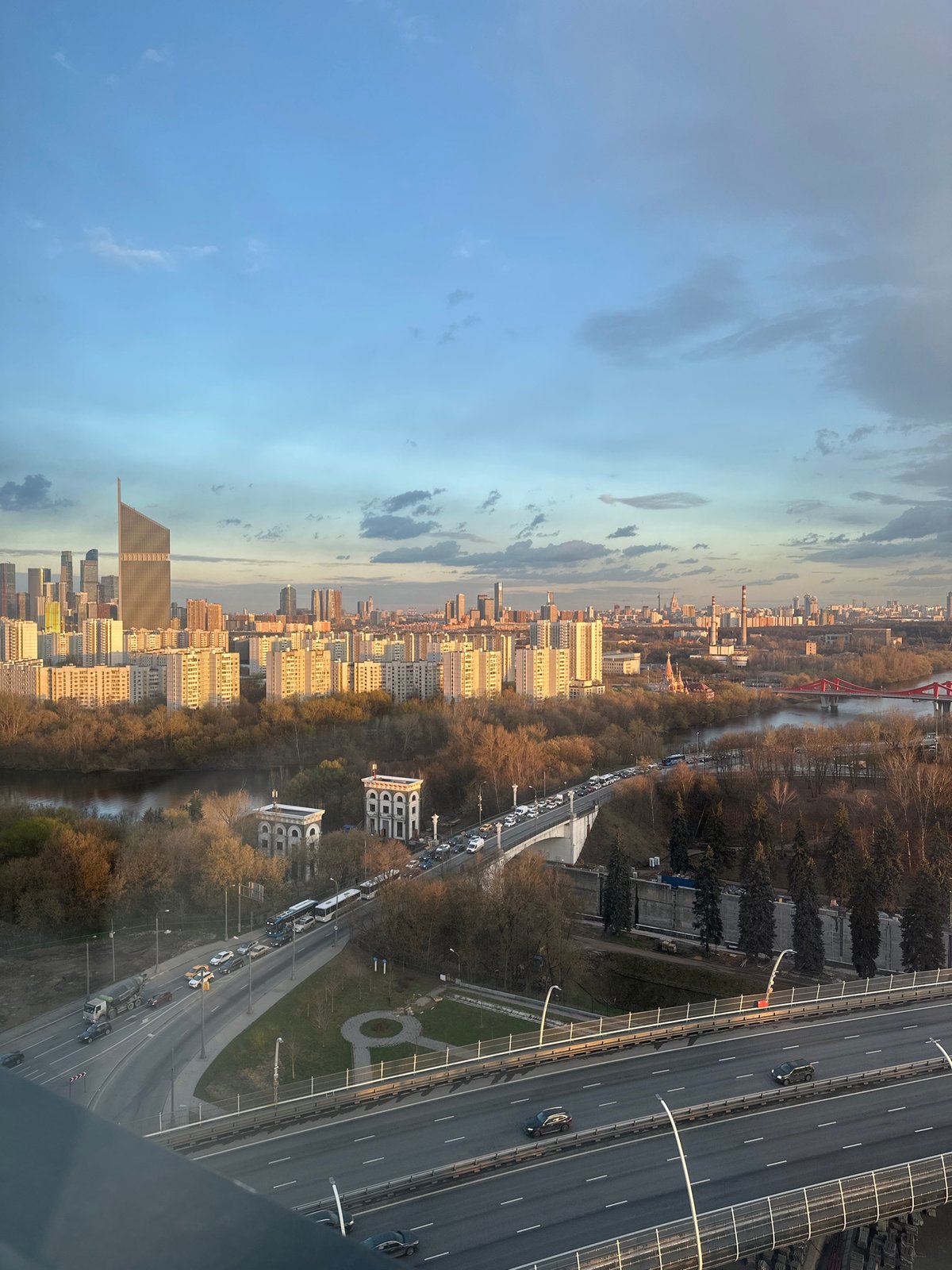 Person documents cityscape views with smartphone in Khimki