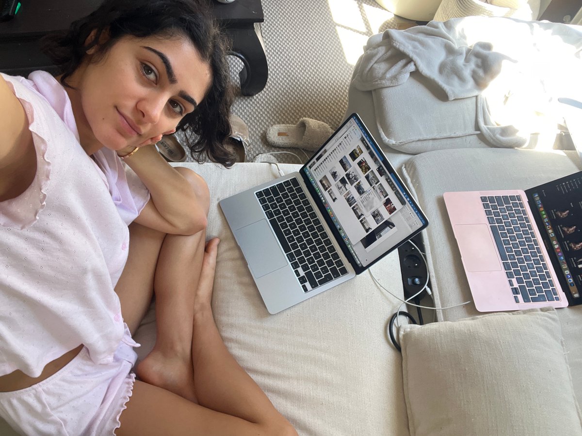 Woman relaxes with electronics in Parisian apartment