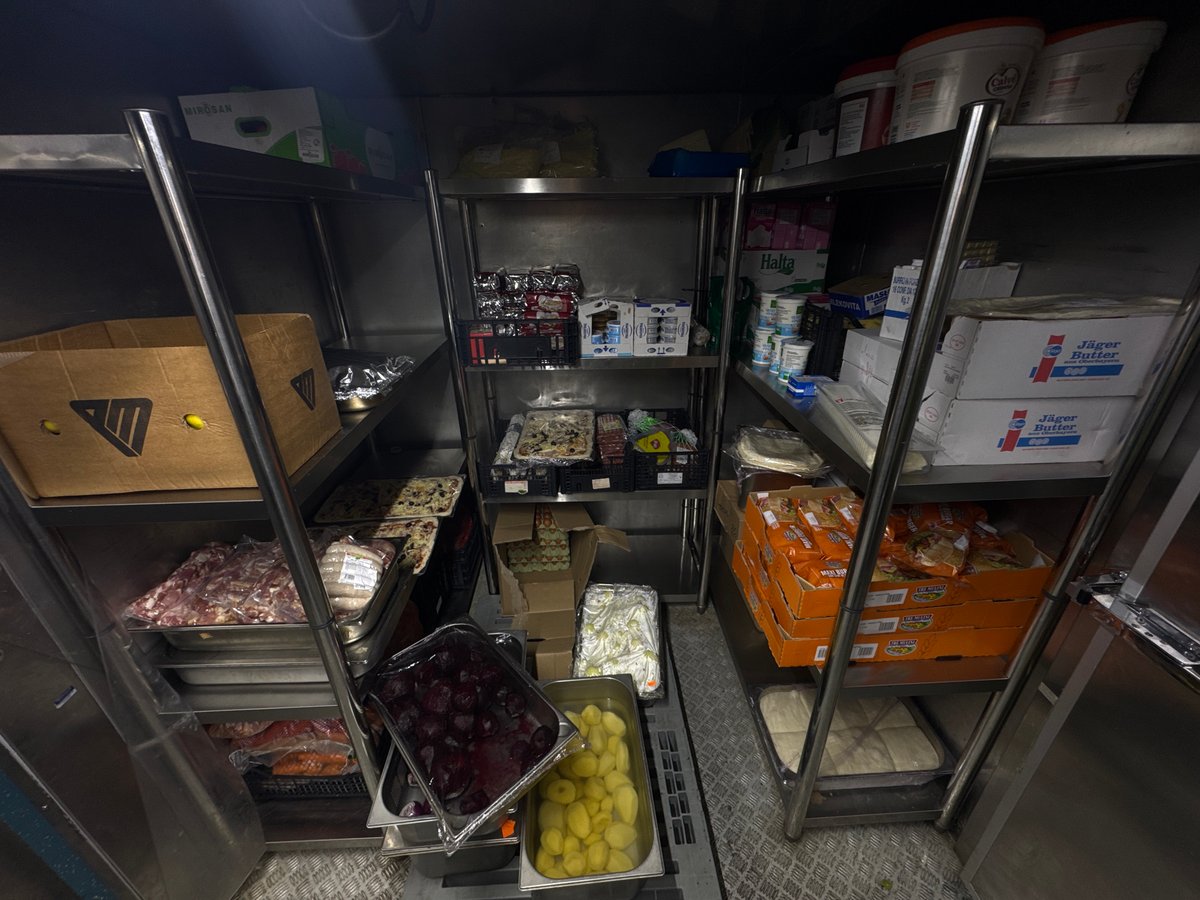 Commercial cold storage unit stocked with food, Marina di Ravenna