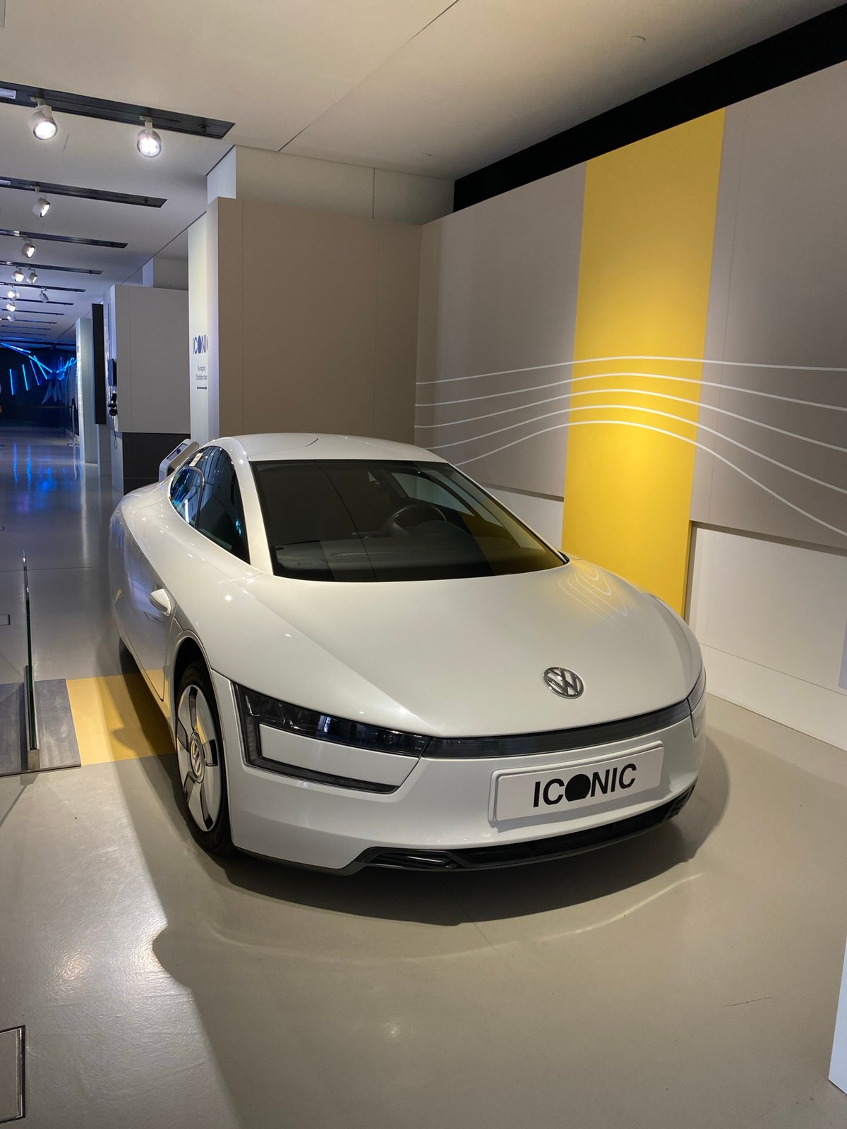 White 'ICONIC' car displayed indoors in Berlin facility