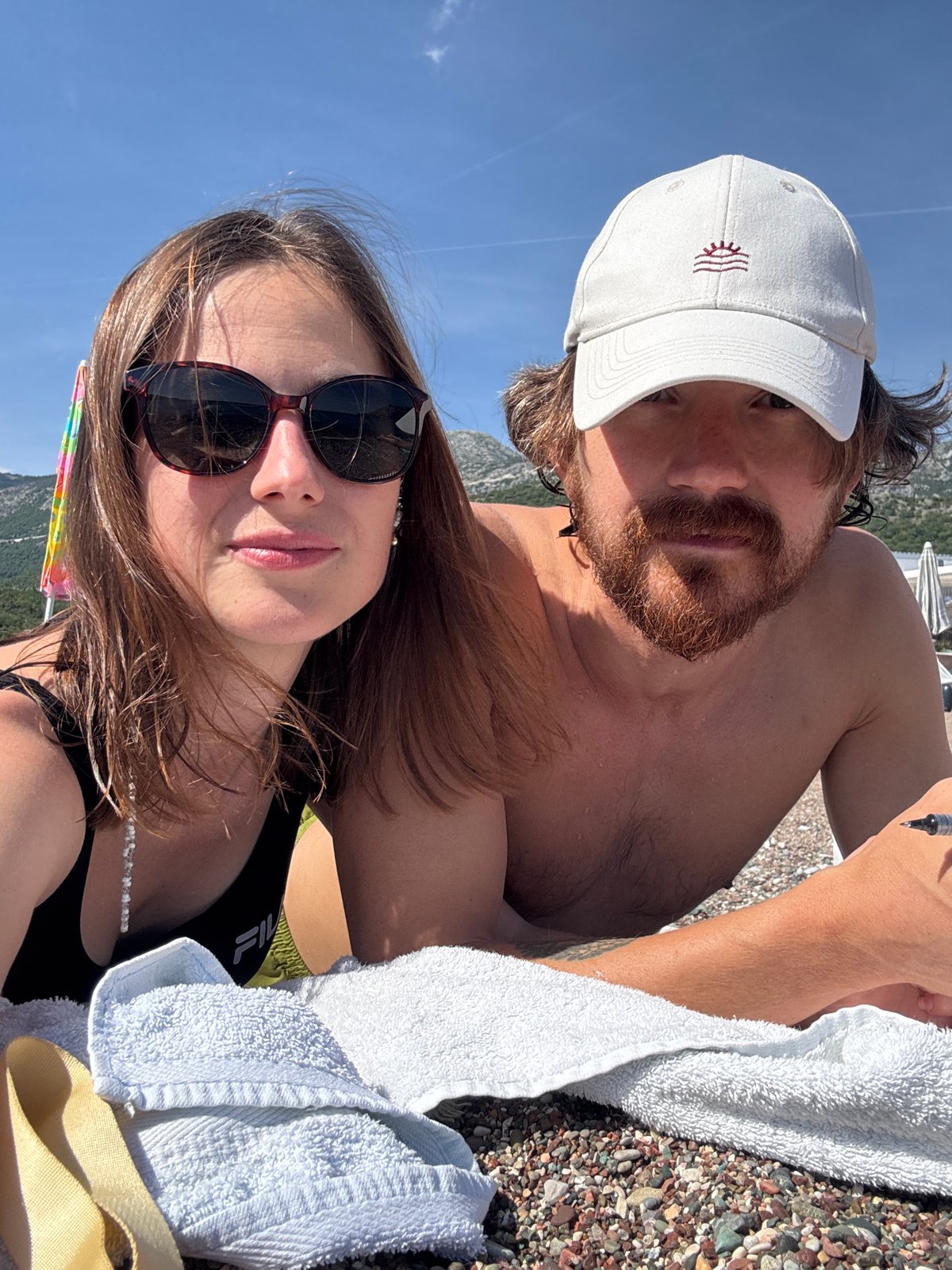 Summer beach activities documented along Montenegro's Adriatic coast resorts