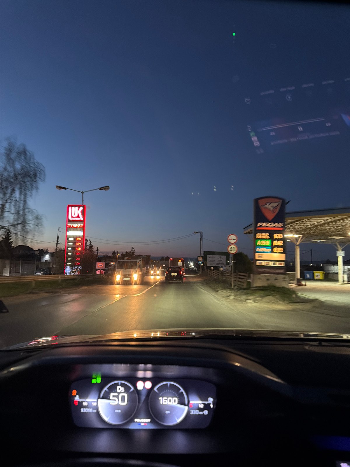 Evening drive past gas stations in Sofia at 50km/h