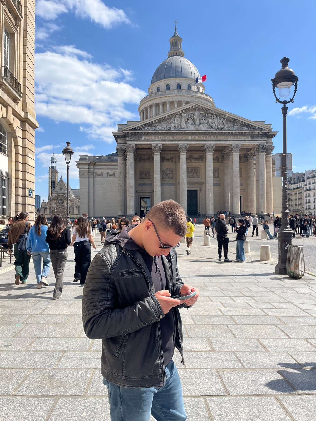 Man spotted in sunny Paris street scene