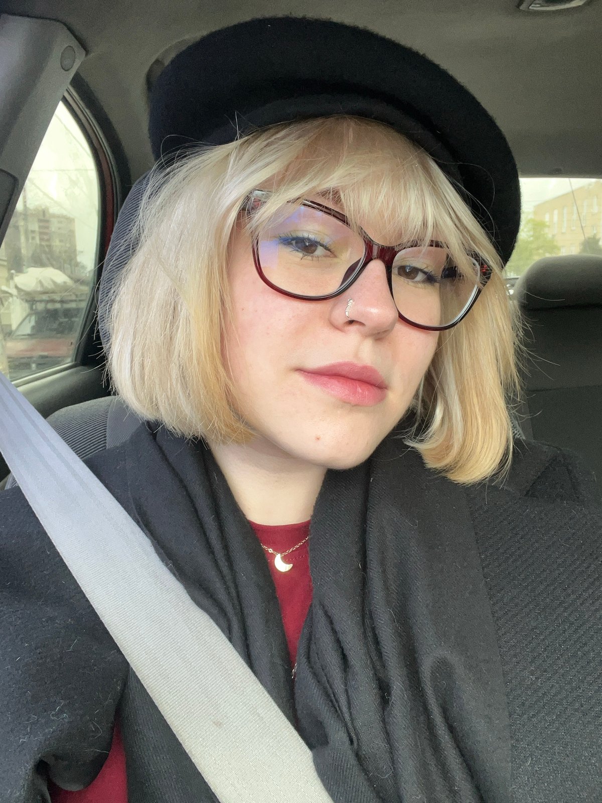 Young Woman Takes Selfie in Car in Odesa