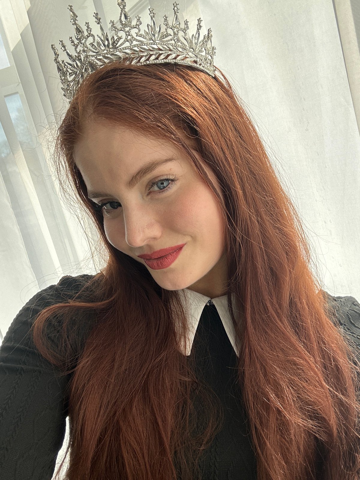 Portrait photograph captured in Riga shows woman with reddish hair