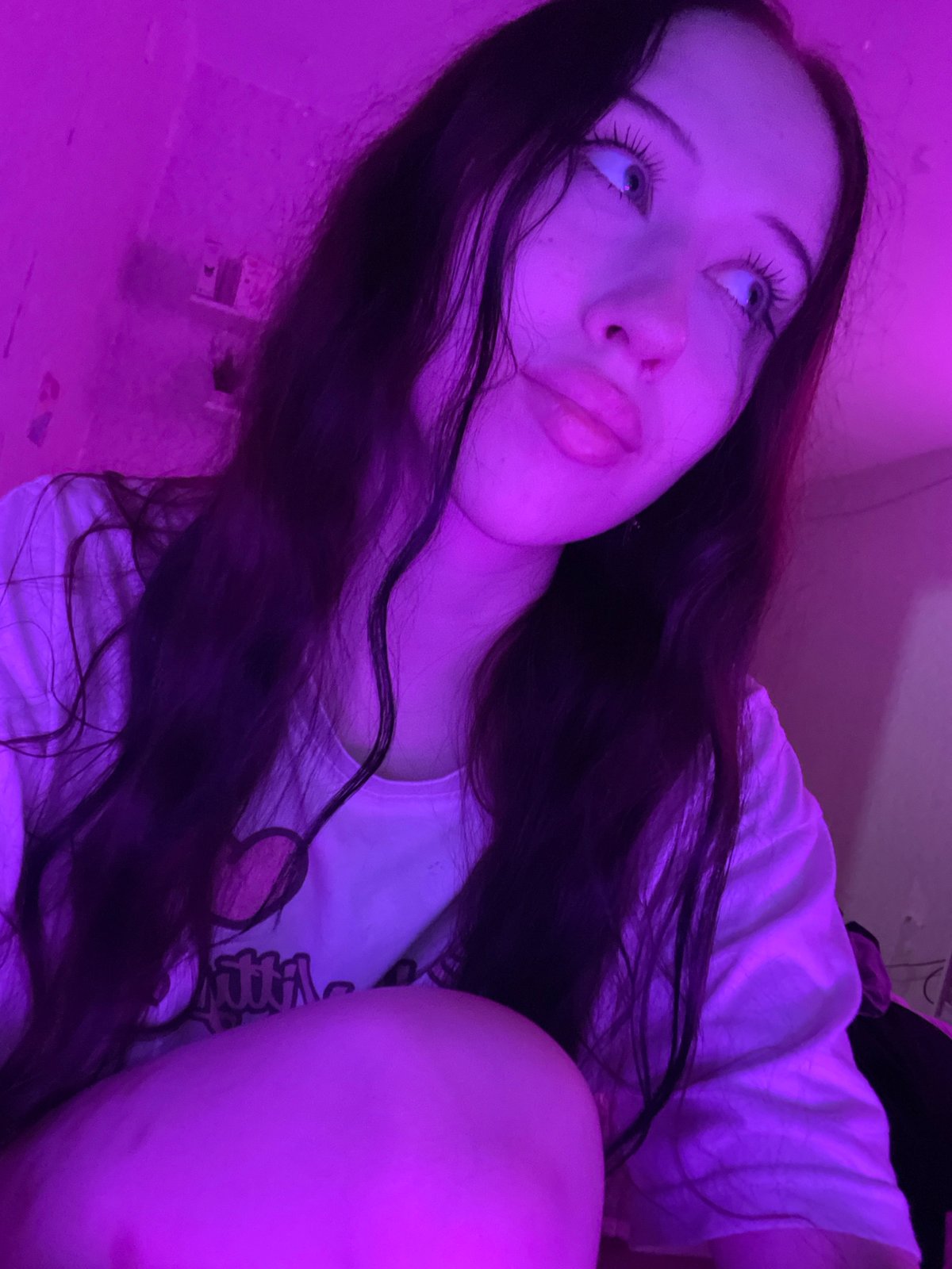 Purple-lit selfie session with pink roses, Votkinsk
