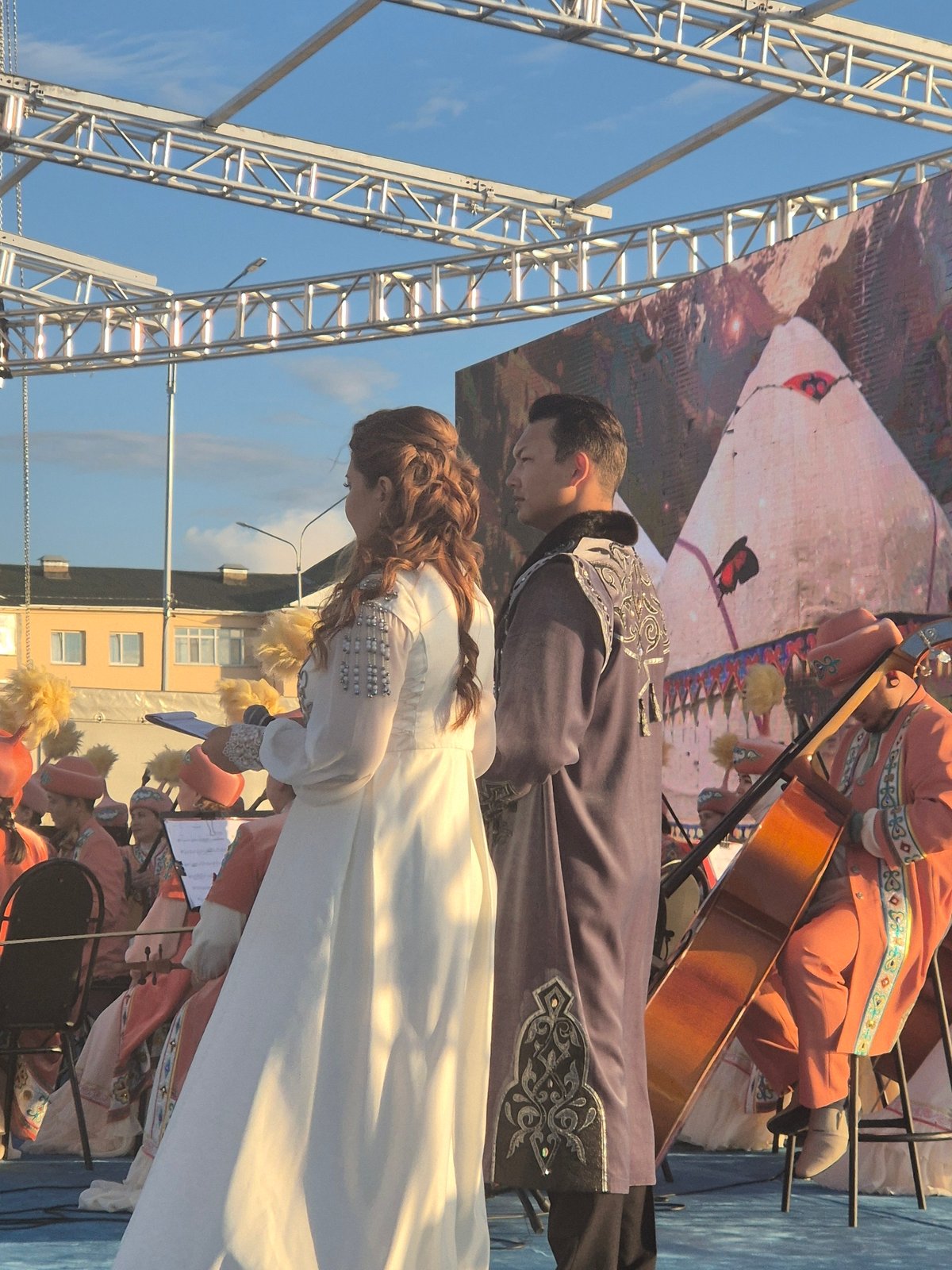 Traditional cultural celebration on an outdoor stage in Kokshetau