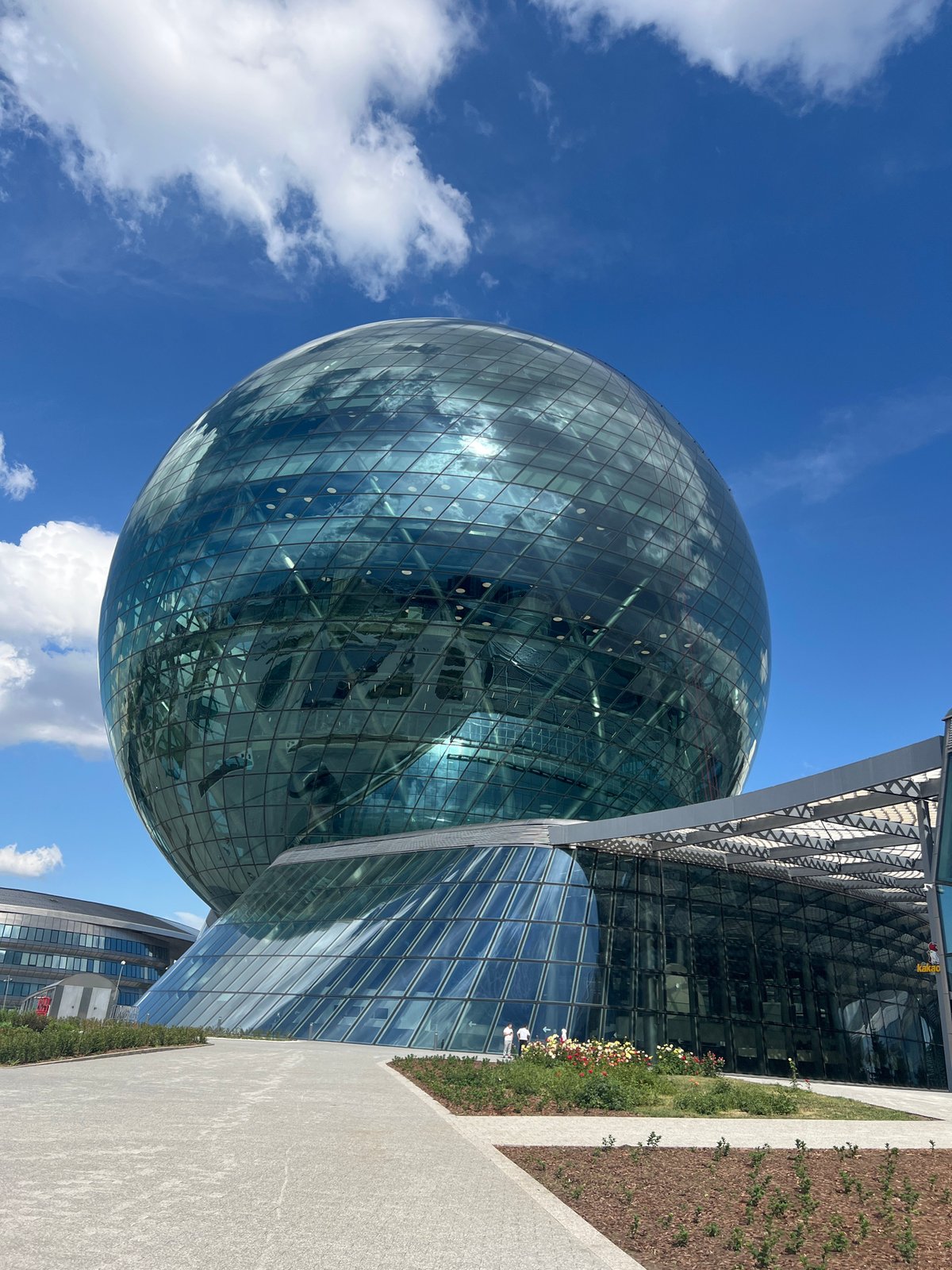 Visitors document Astana's iconic glass sphere pavilion complex
