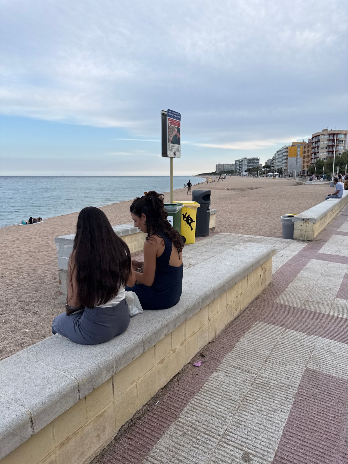 Summer afternoon across Blanes beach and waterfront promenade