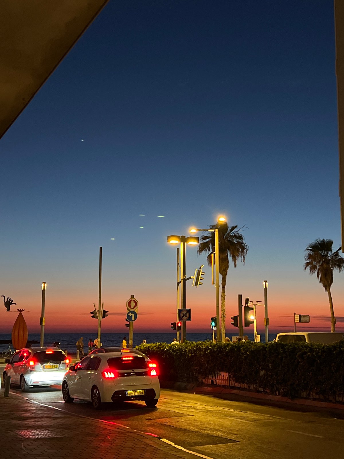 Evening scenes documented across Tel Aviv during twilight hours