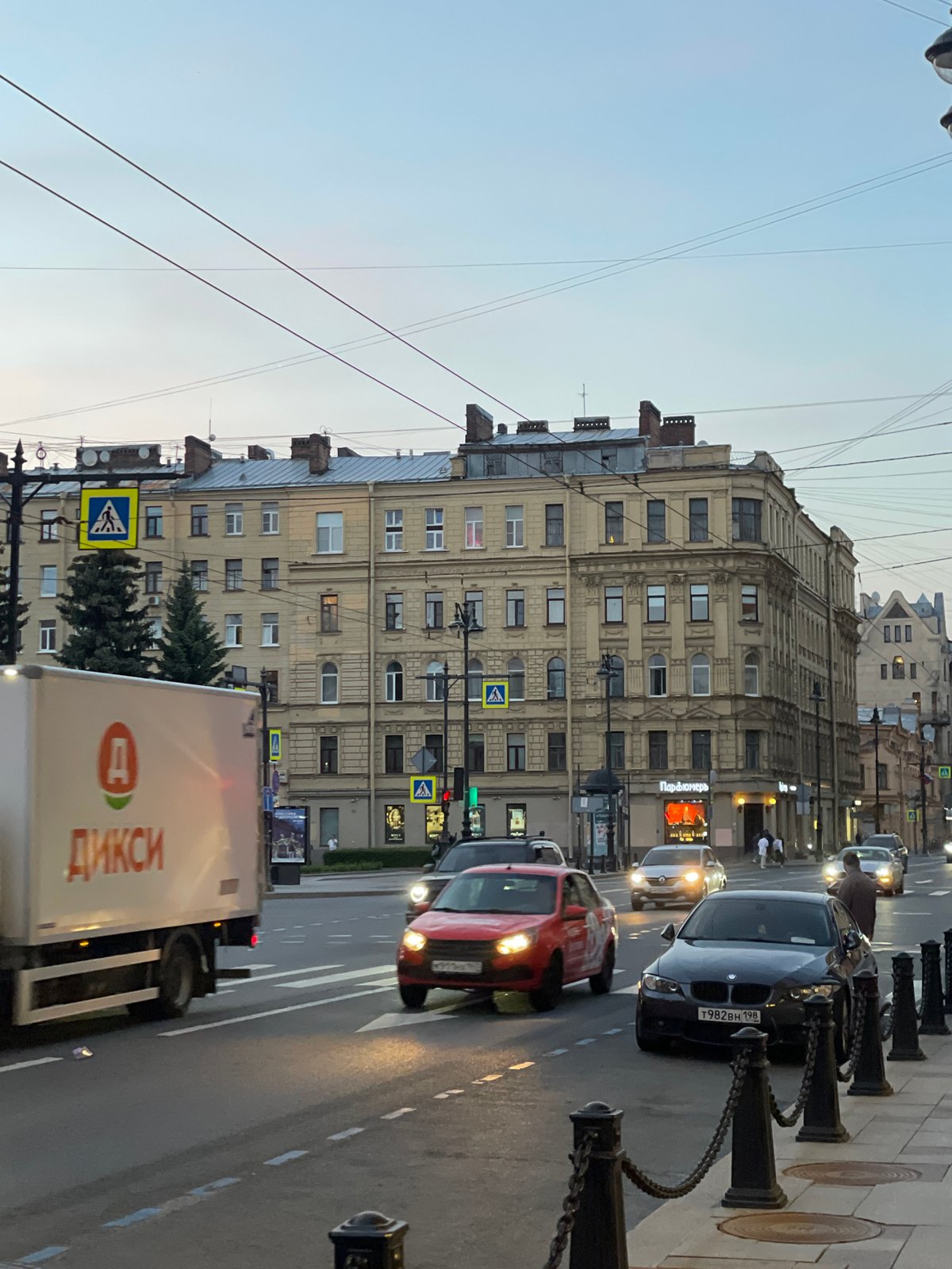 Evening street documentation captures Saint Petersburg storefronts and architecture