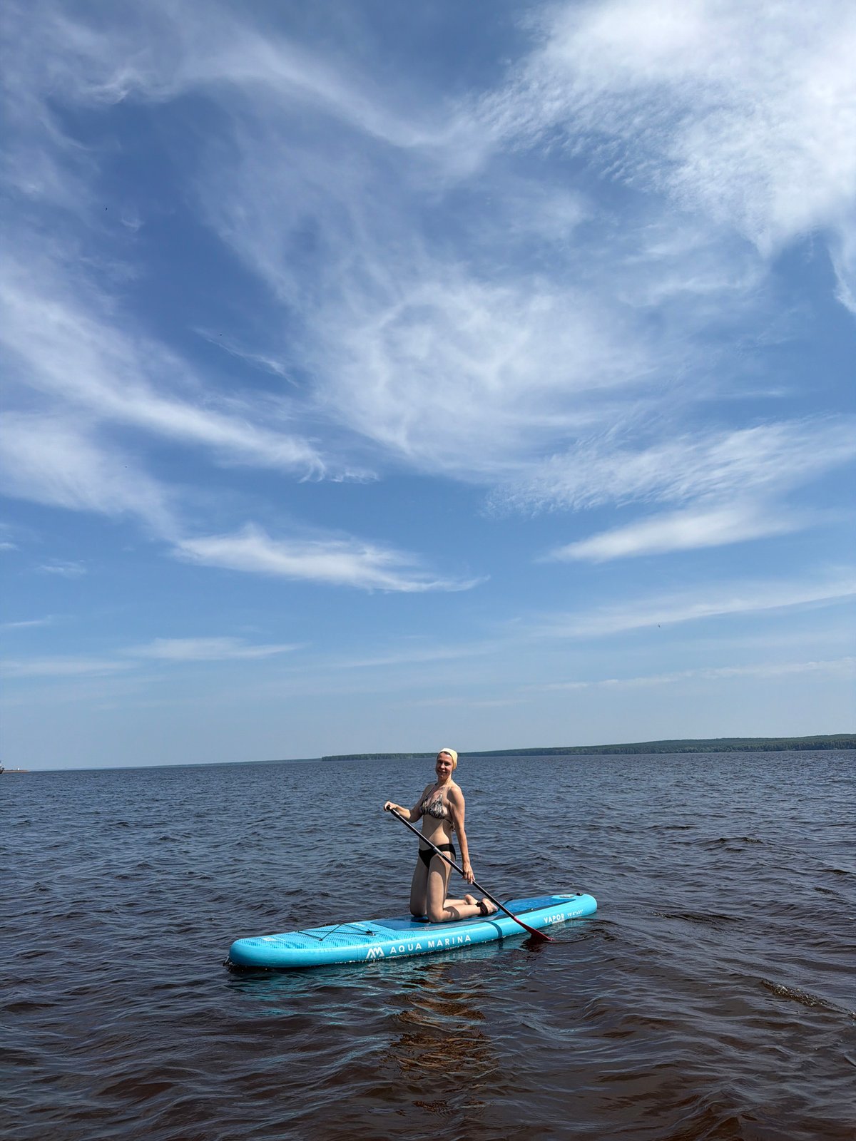Summer paddleboarding and lakeside hangout in Chaikovsky