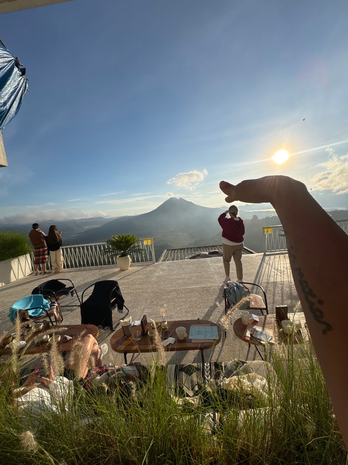 Misty Mount Batur viewed from terrace in Kedisan, Indonesia