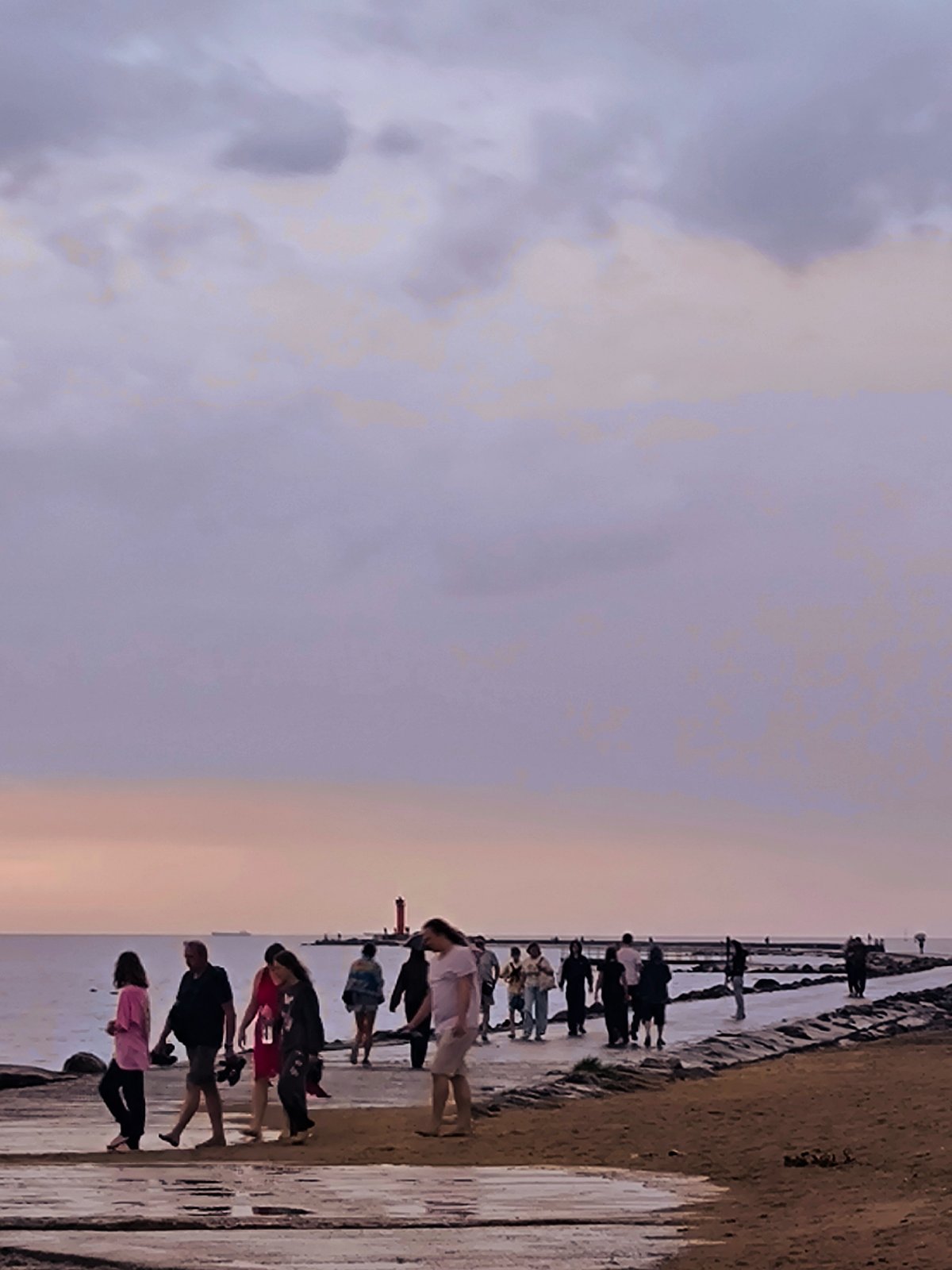 Dusk along Riga's pier and shoreline, water and soft light.