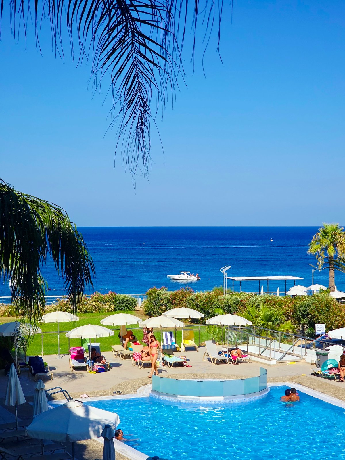 Sun, pools, and boats along the Protaras coastline