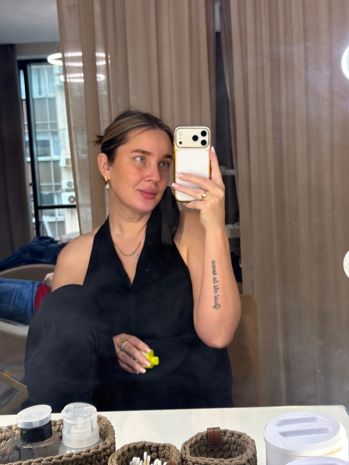 Woman takes mirror selfies in Moscow dressing room