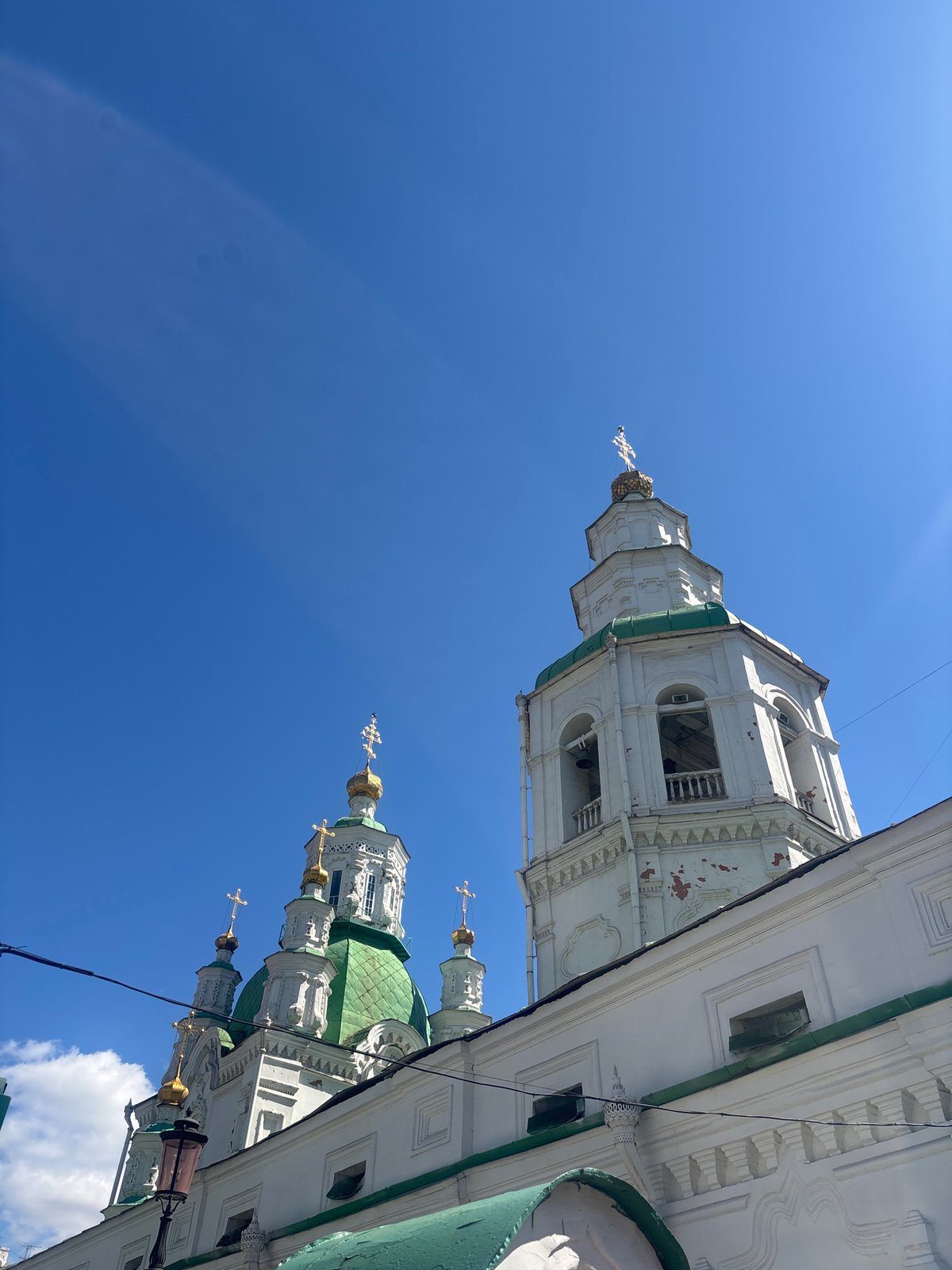Morning architectural documentation in Krasnoyarsk captures cathedral and ornate buildings