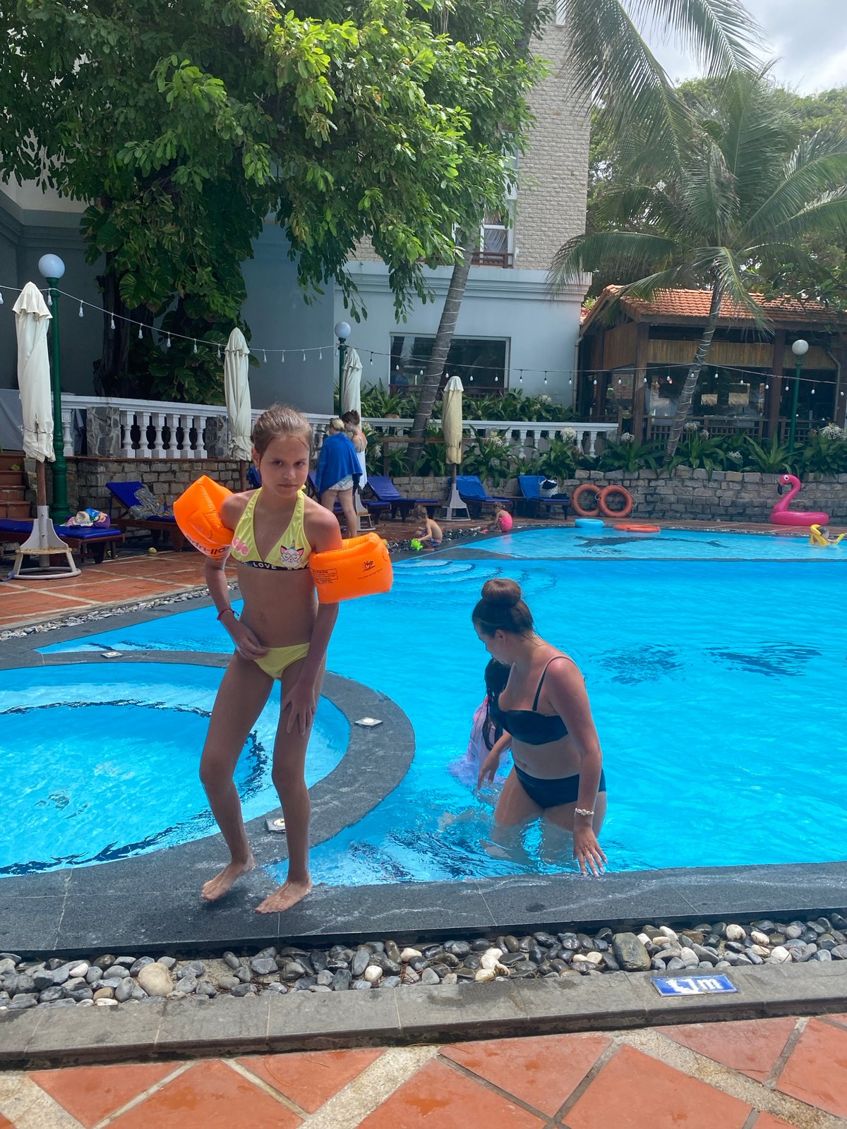 Lazy resort day by the pool and beach in Mũi Né