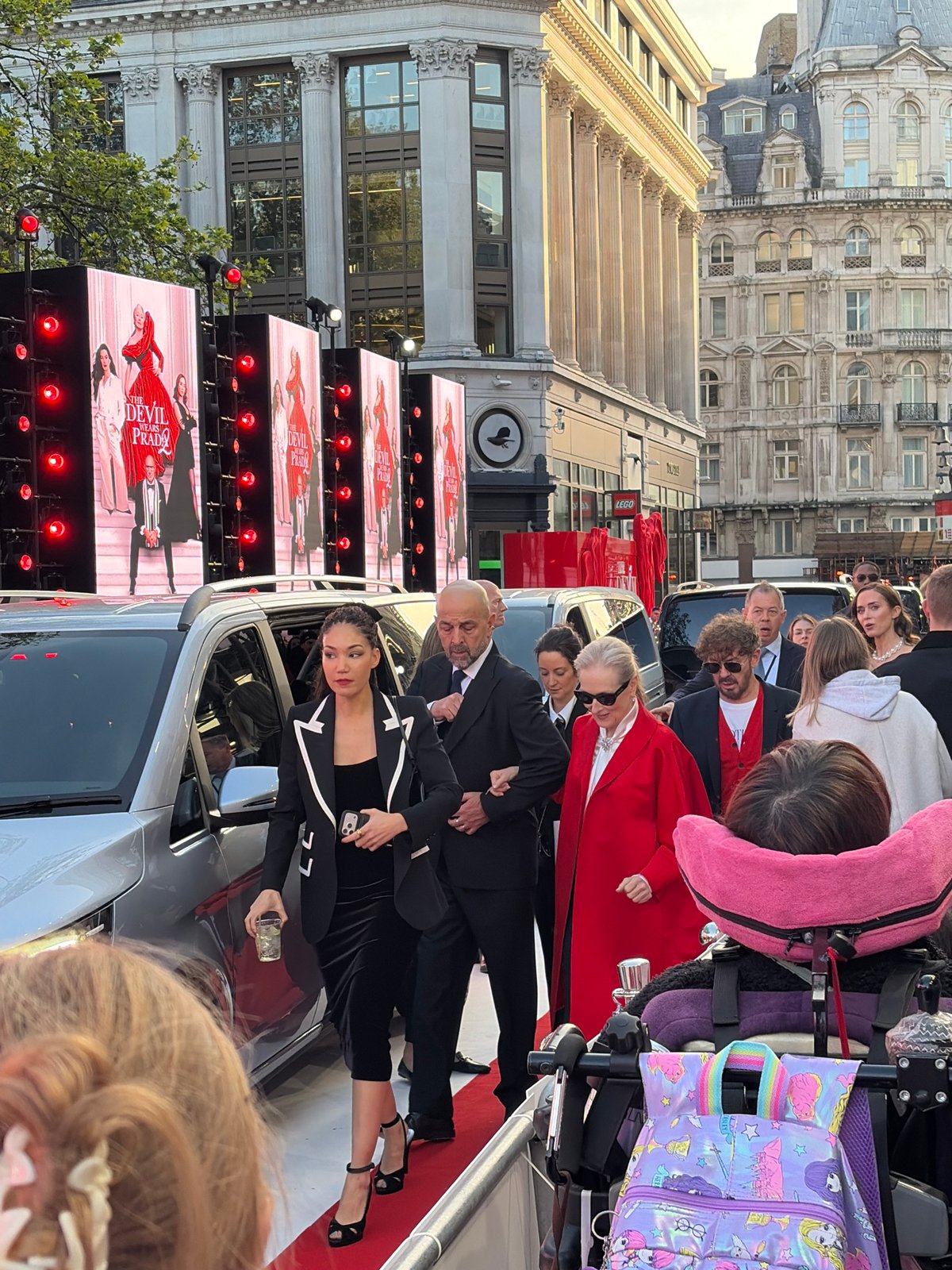 Red carpet event draws crowd in urban setting