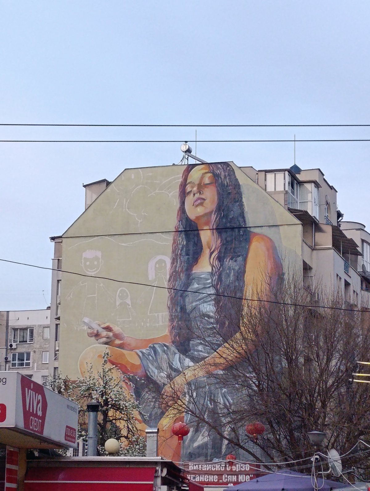Mural of woman with chalk spotted on Sofia building