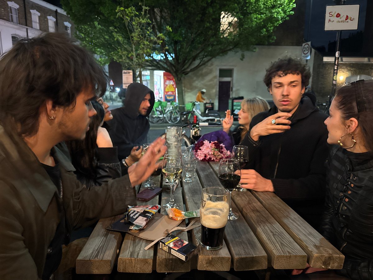 Young adults gather at outdoor London seating area