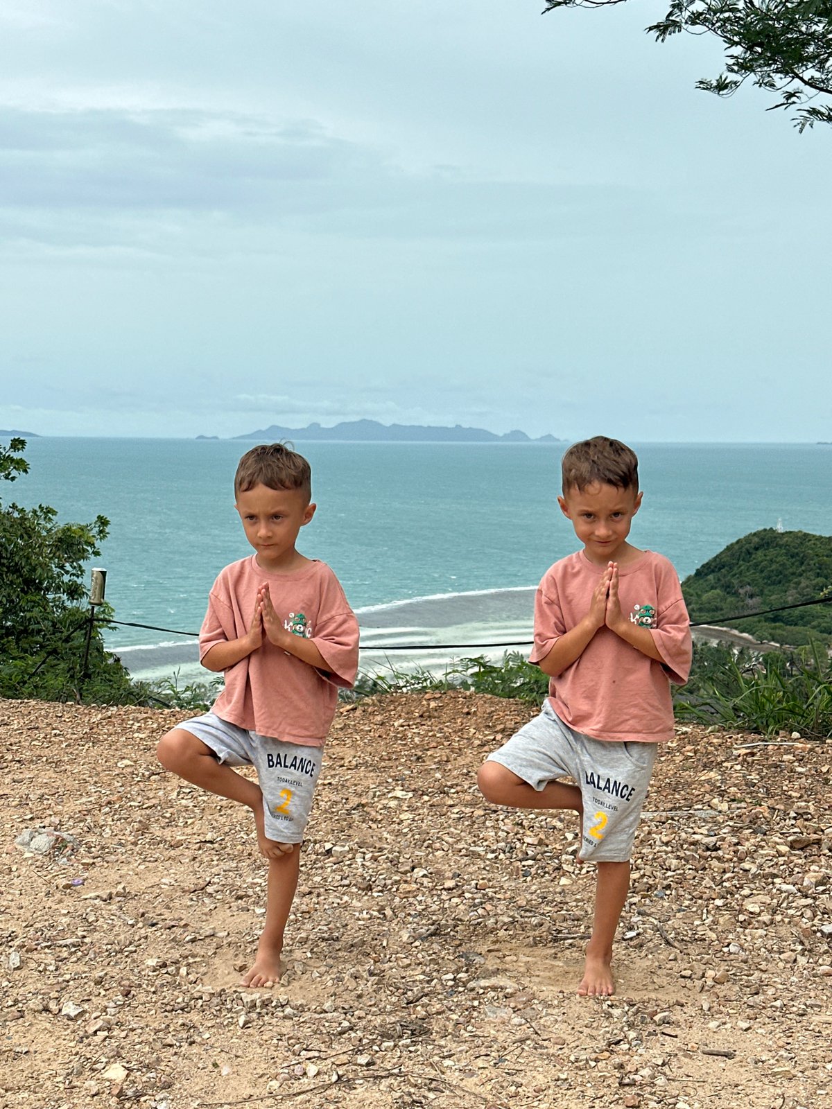 Yoga poses and coastal views on a cloudy Ko Samui morning
