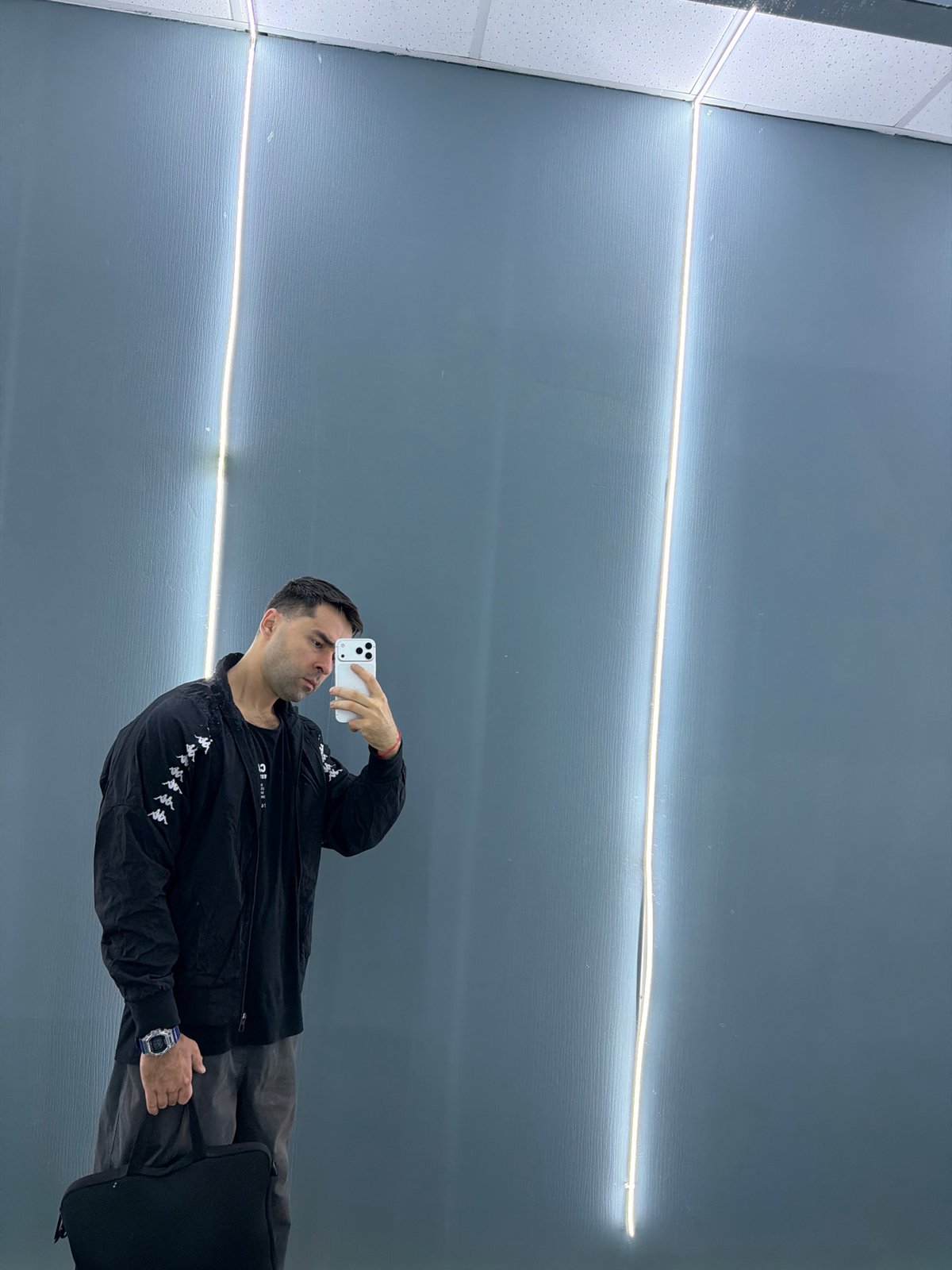 Man takes selfie in Krasnoyarsk indoor space