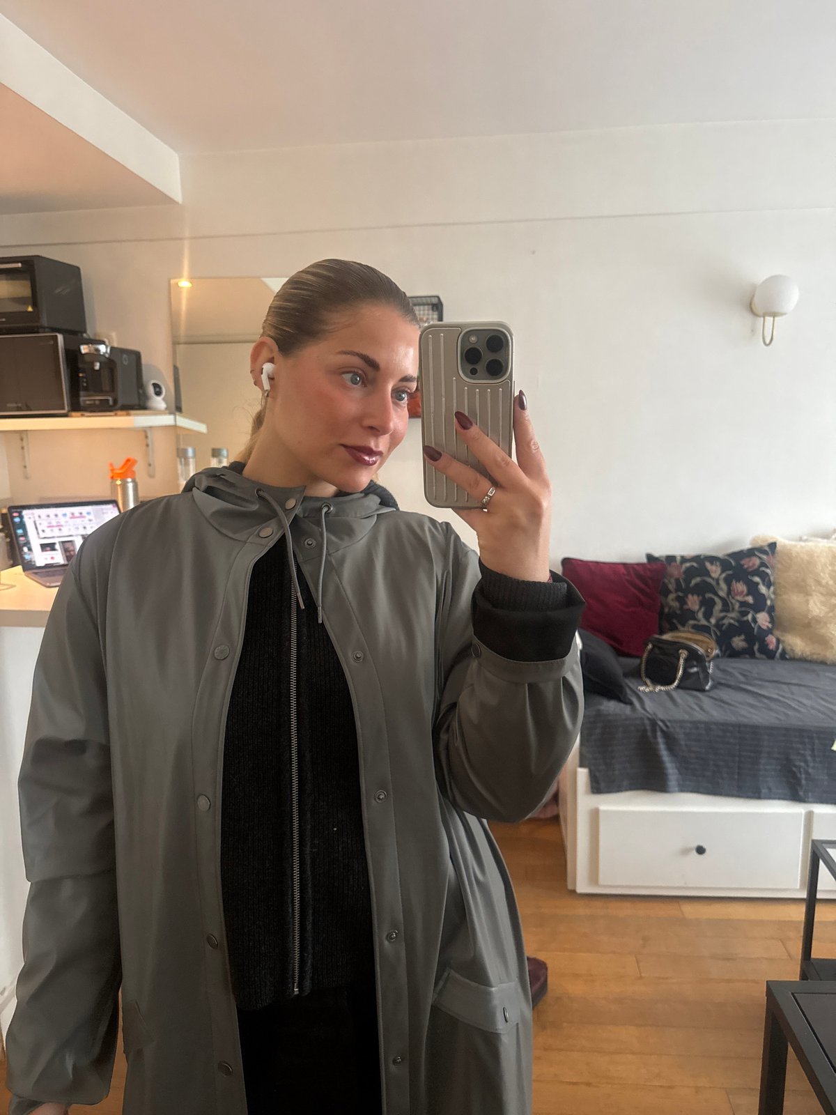 Woman takes selfies indoors in Paris