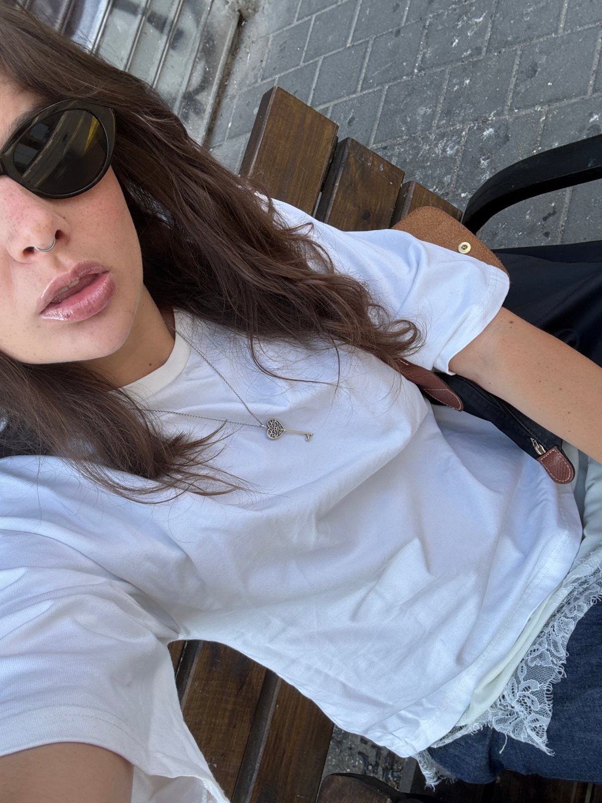 Early morning selfie session documented on Tel Aviv street