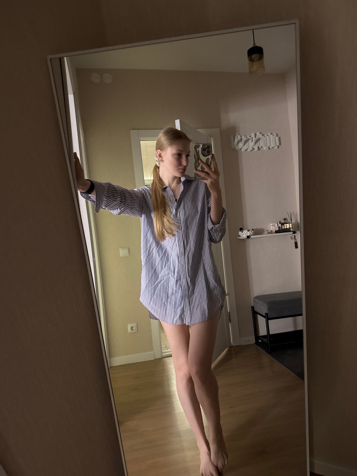 Woman documents early morning selfie session across Perm
