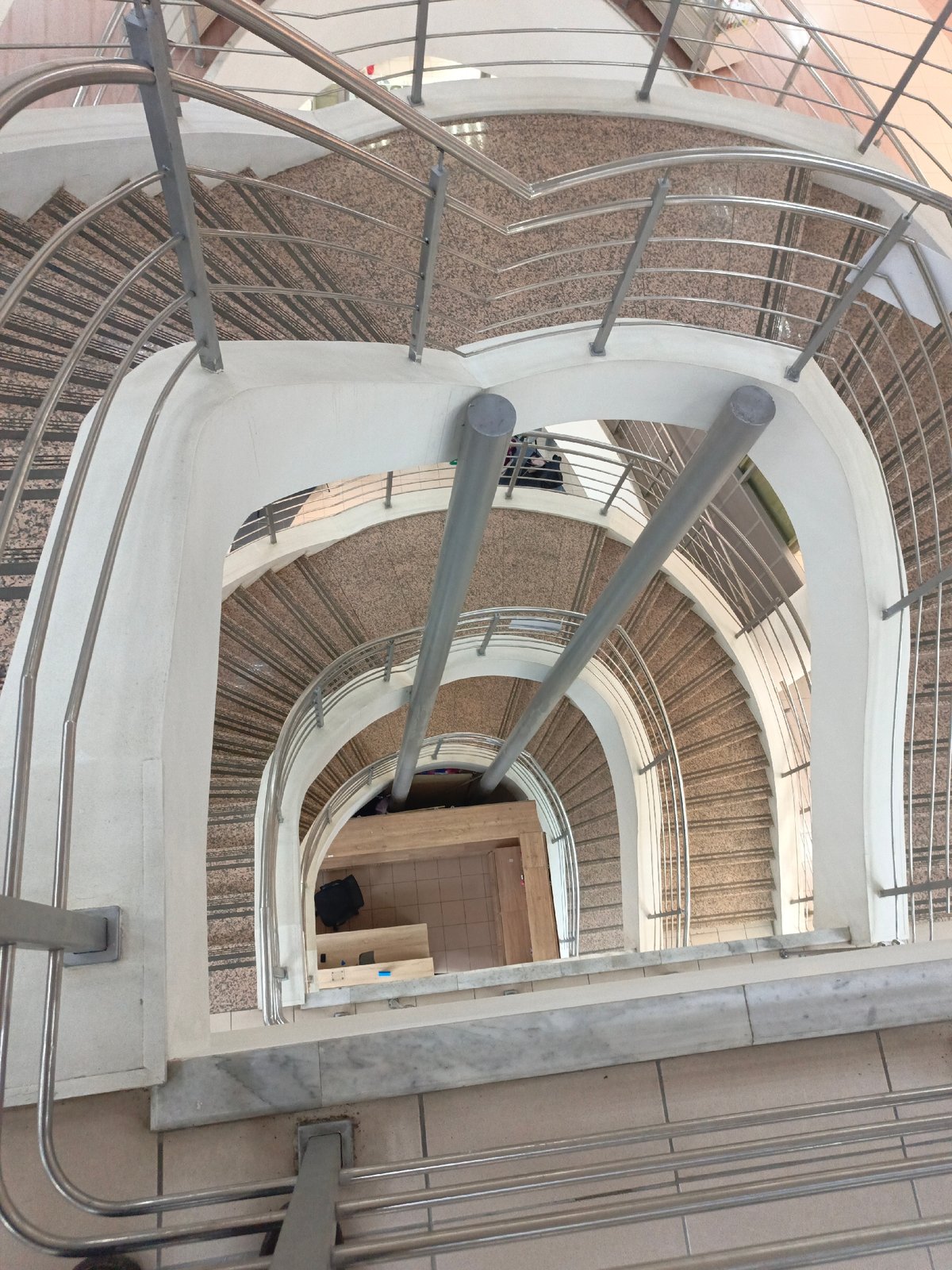 Morning snapshots capture stairs, street art, and puppet display