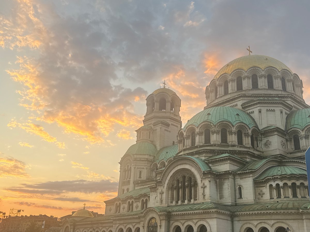 Ornate domed cathedral exterior, two angles, golden hour