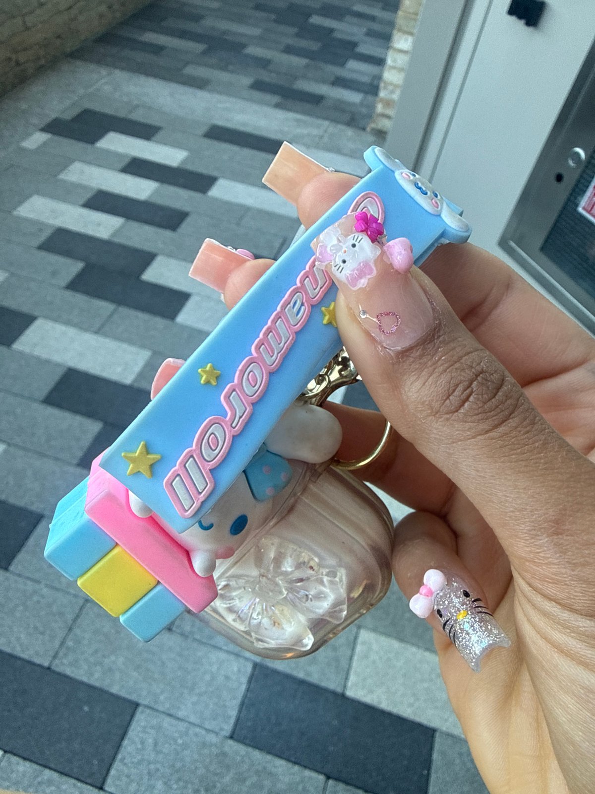London resident displays Cinnamoroll keychain with decorated nails