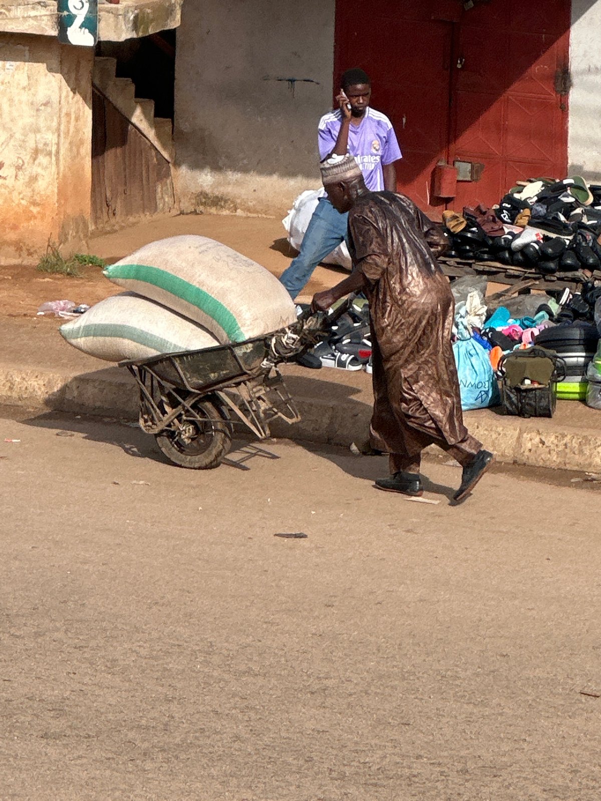 Morning street scenes across Bukuru, Nigeria markets and roads