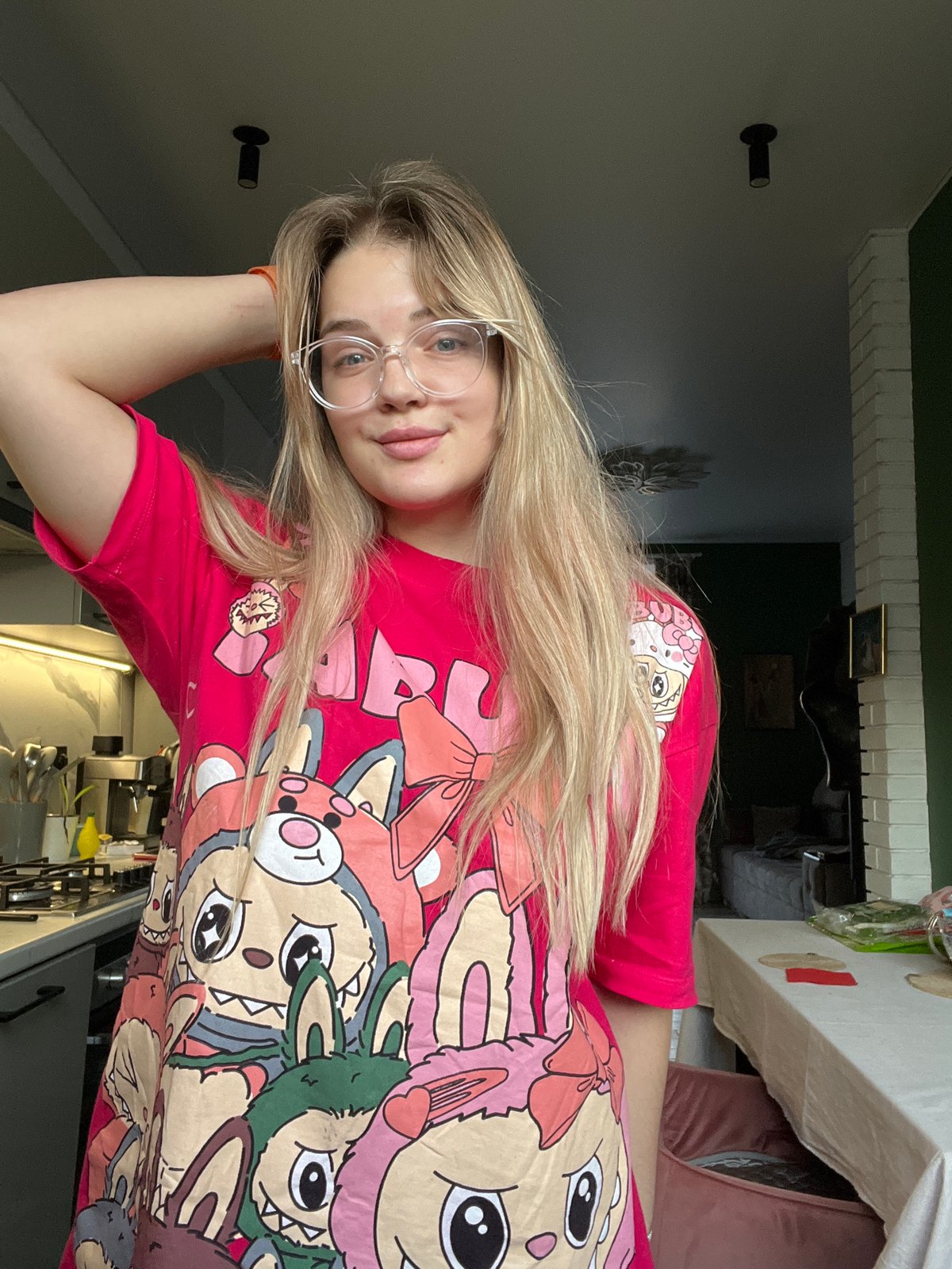 Woman documents casual afternoon with selfies and cat photos