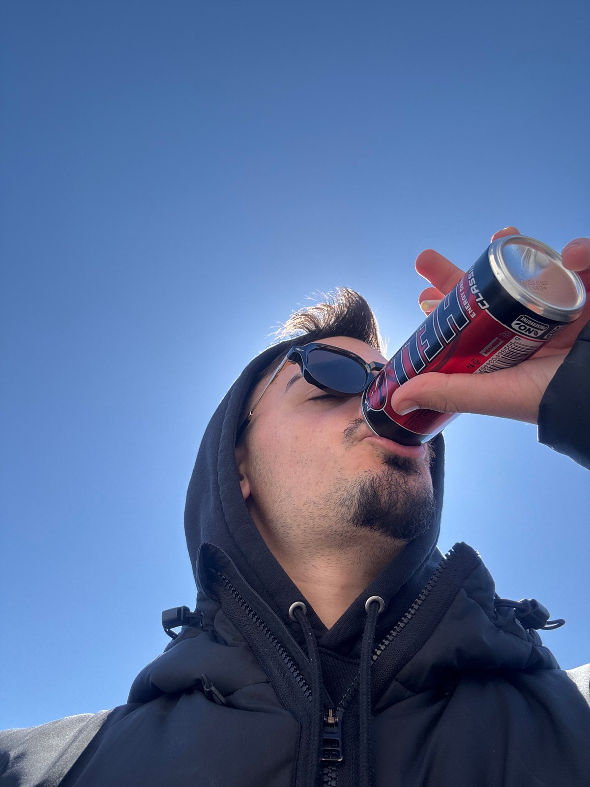 Man in black jacket spotted on Sofia rooftop overlooking city