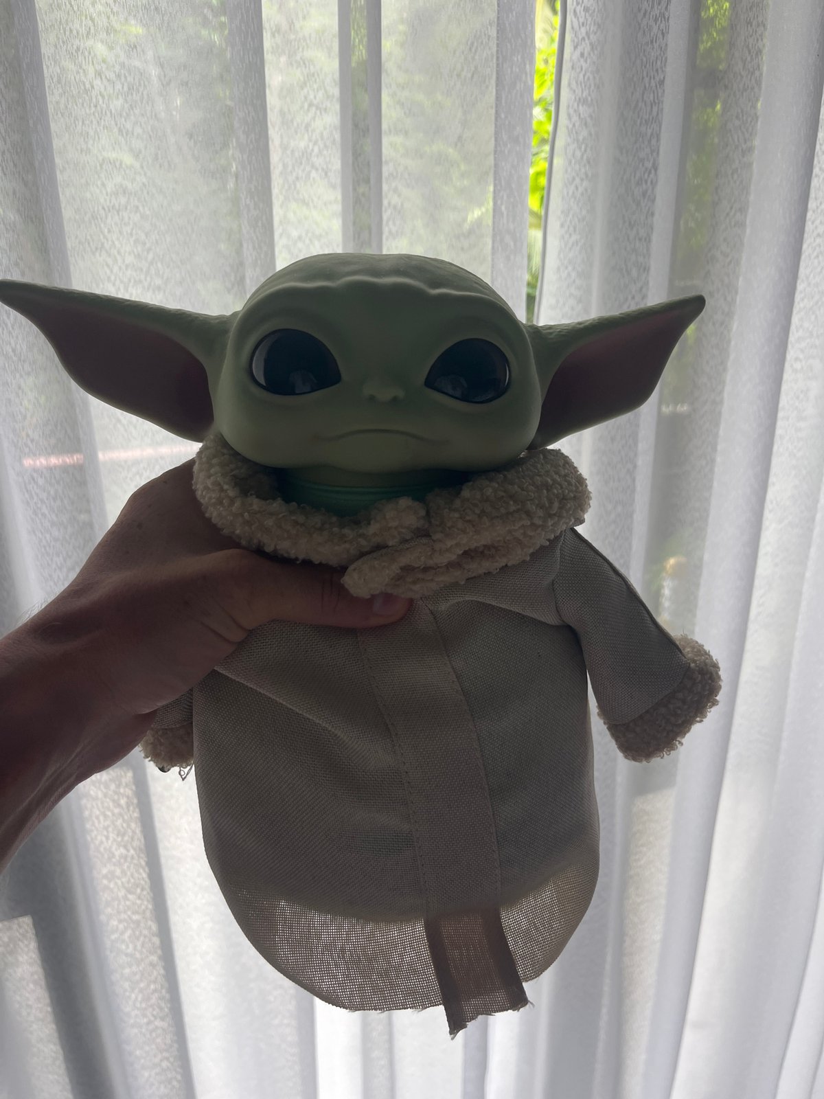 Grogu plush toy documented in morning car journey, Rawai Thailand