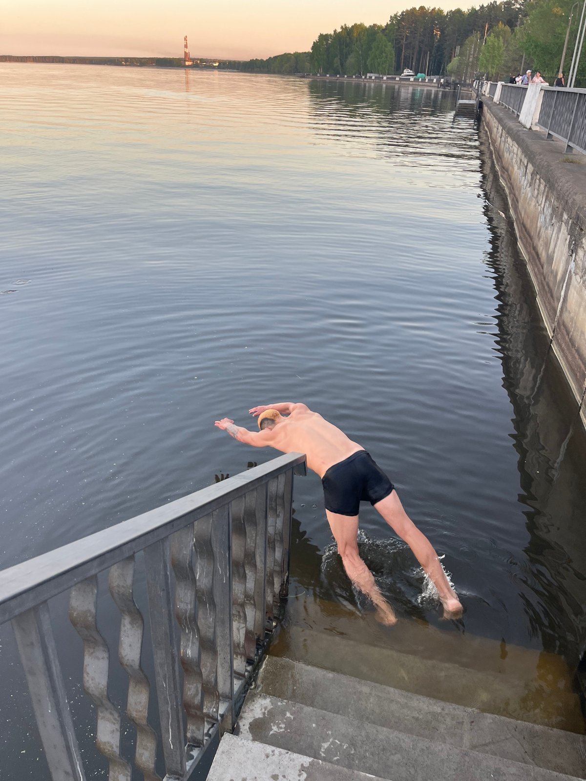 Man dives into water near Chaikovsky, Russia