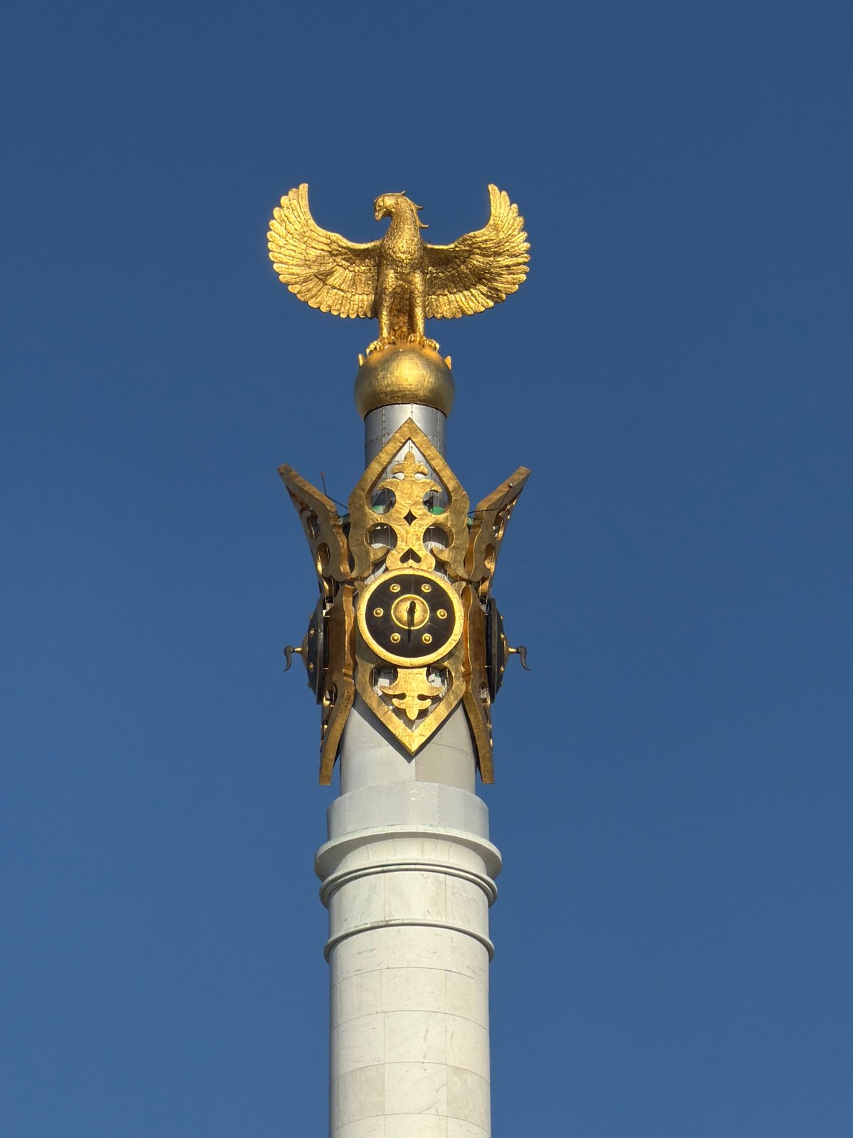 Astana's Independence Square monument and fountain on a sunny day