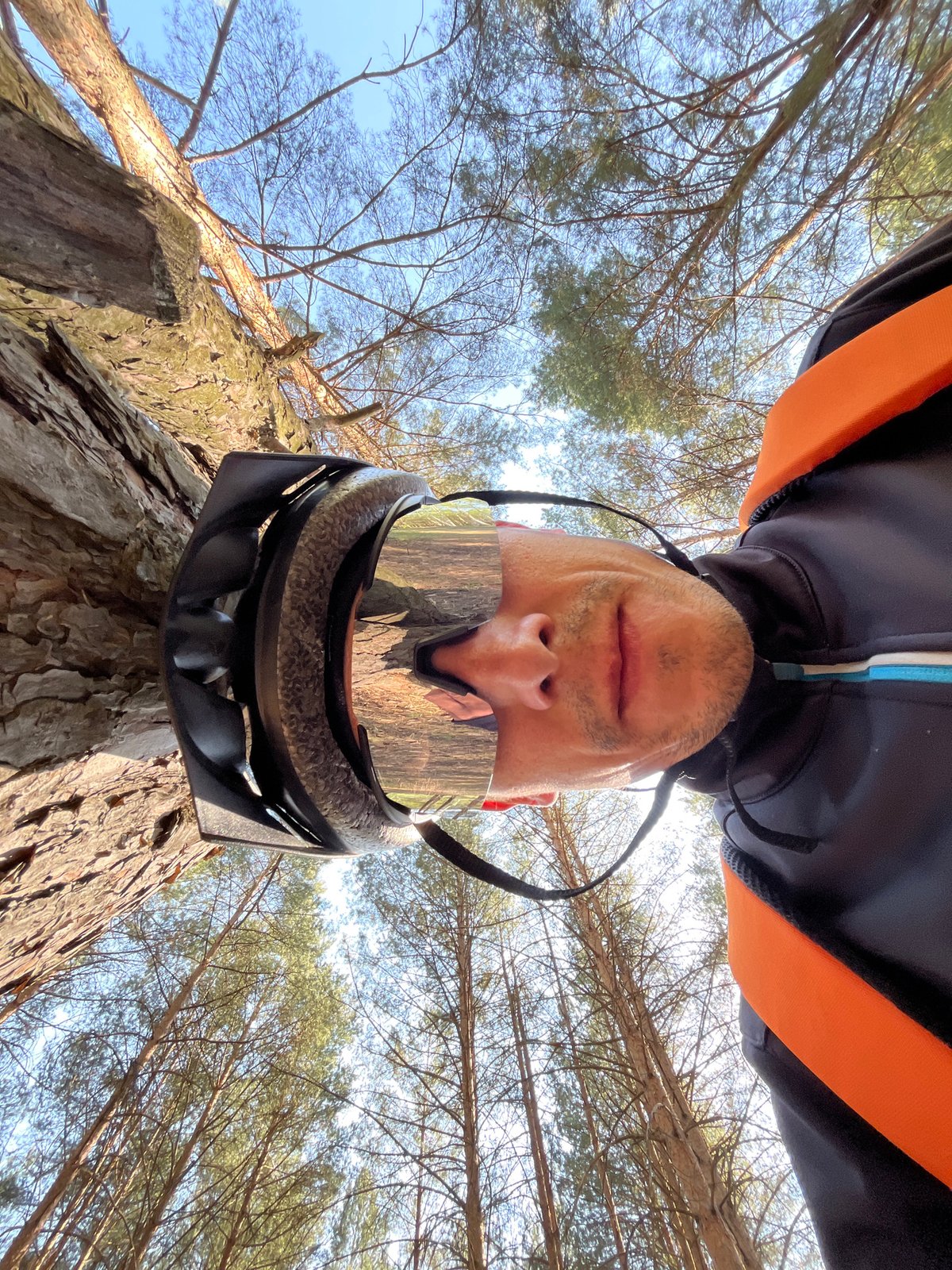 Cyclist rests during forest ride near Chaikovsky, Russia