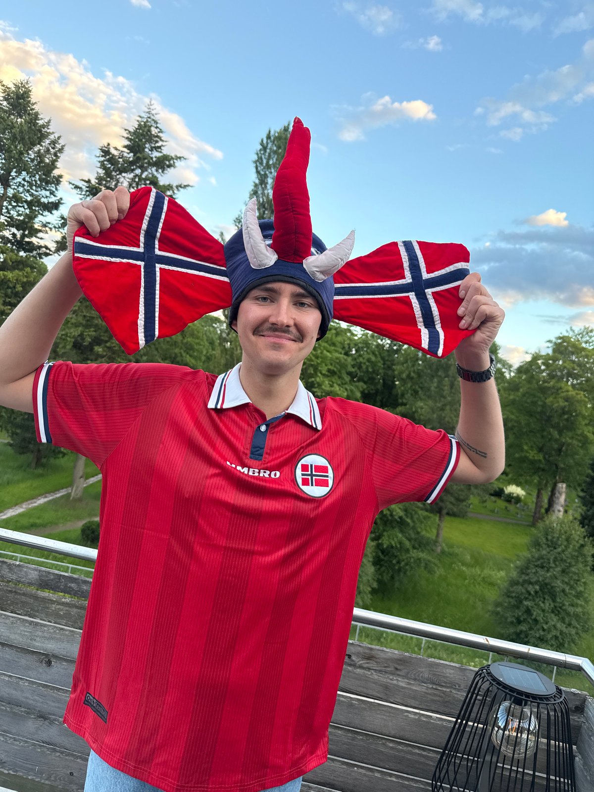 Oslo crew watches football on a bright June evening
