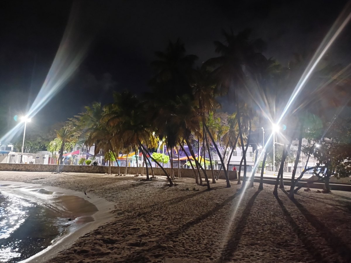 Nighttime walk documented through Juan Griego's streets and waterfront