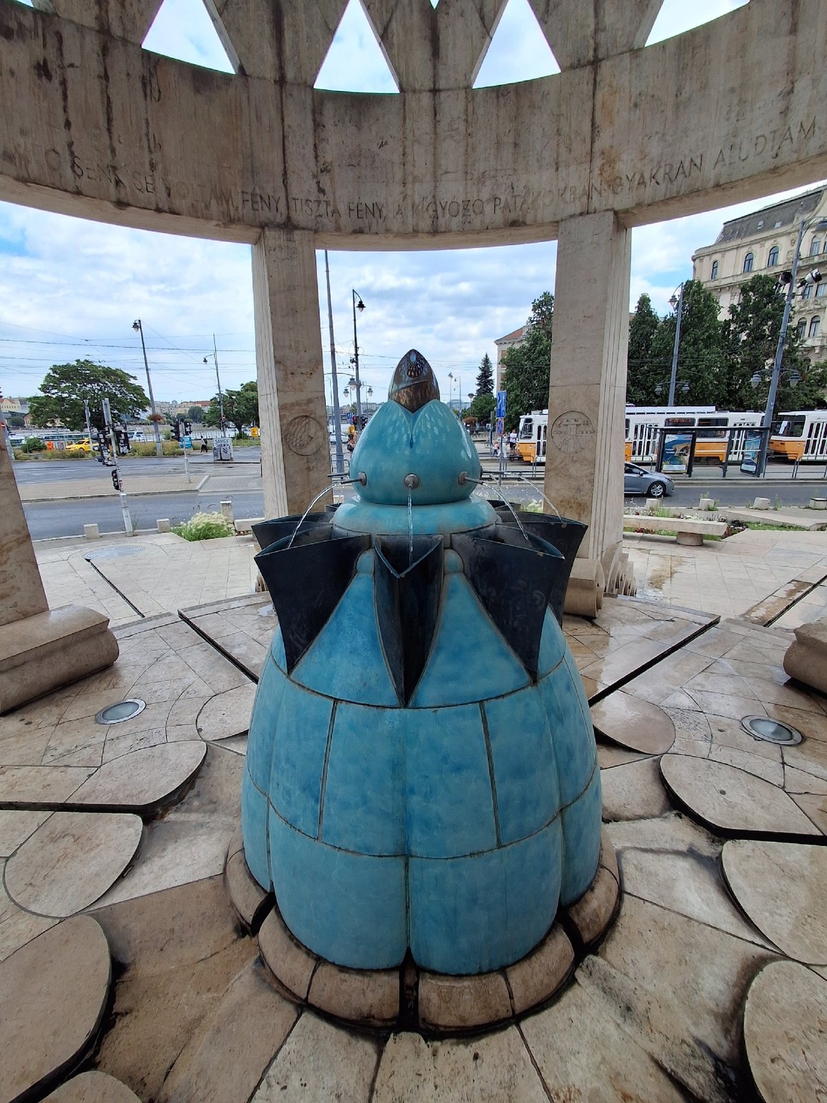 Teal crowned fountain flows in Budapest