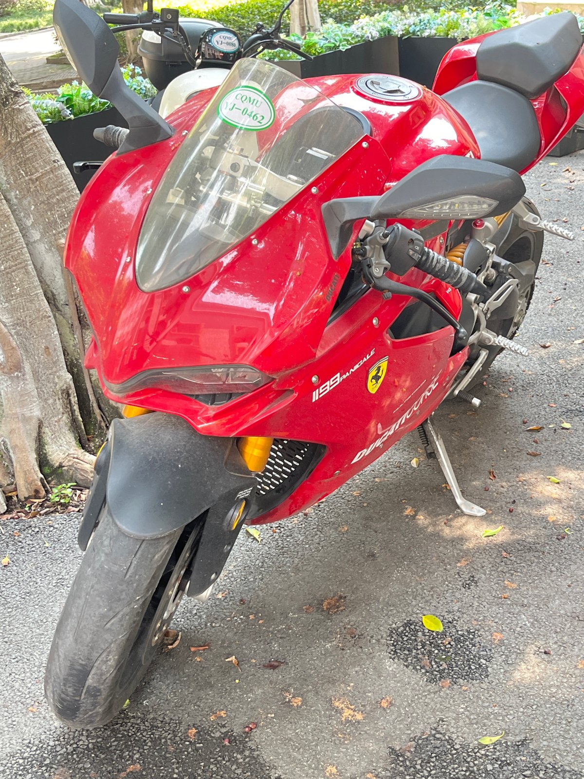 Urban scenes and red Ducati documented in Yuzhong District
