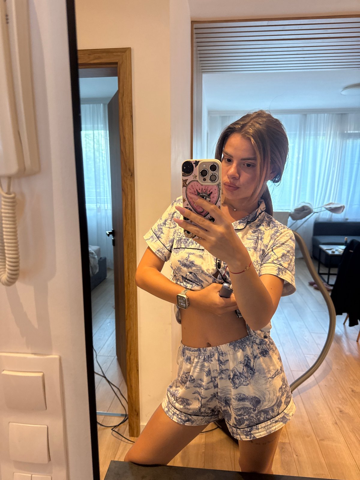 Woman takes pajama selfies, rice cooking documented same afternoon