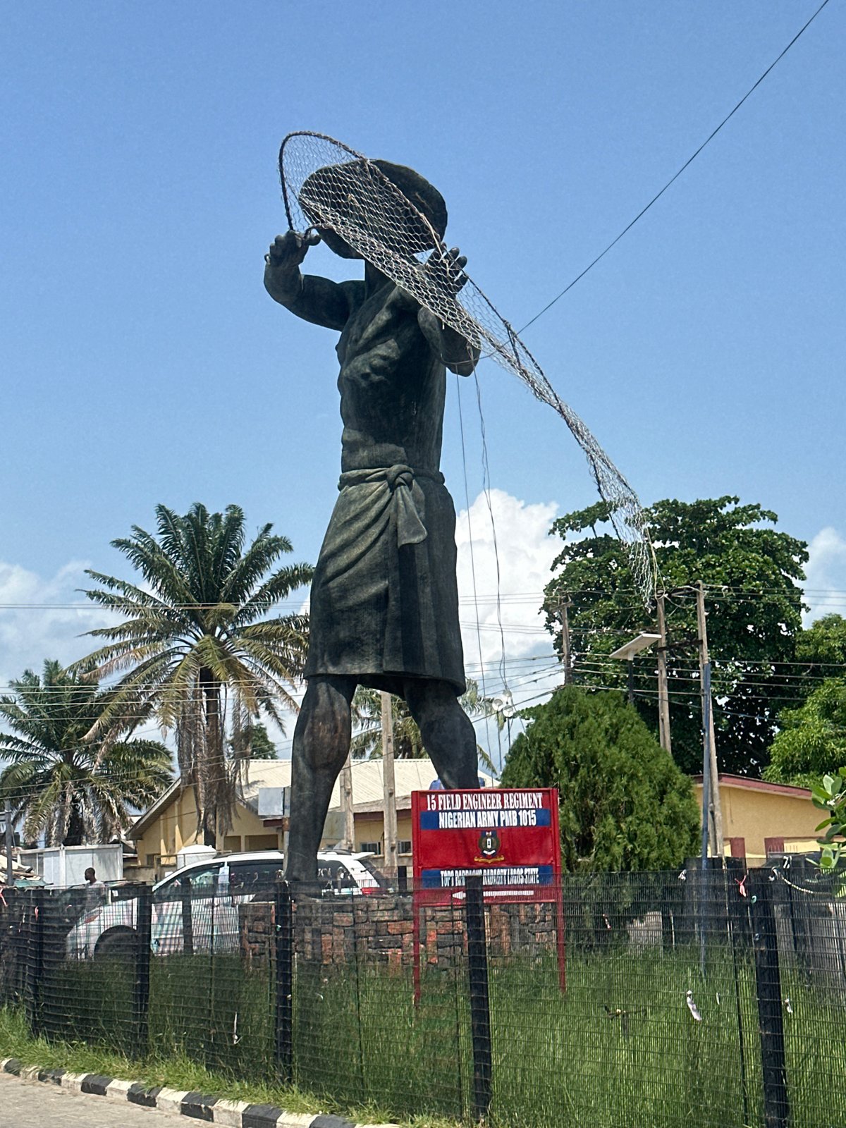 Bronze fisherman statue documented by witnesses in Badagry, Nigeria