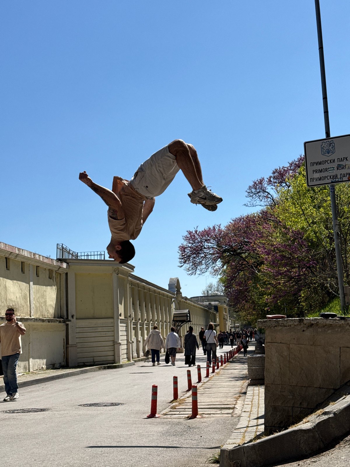 Man performs backflips in public space in Varna
