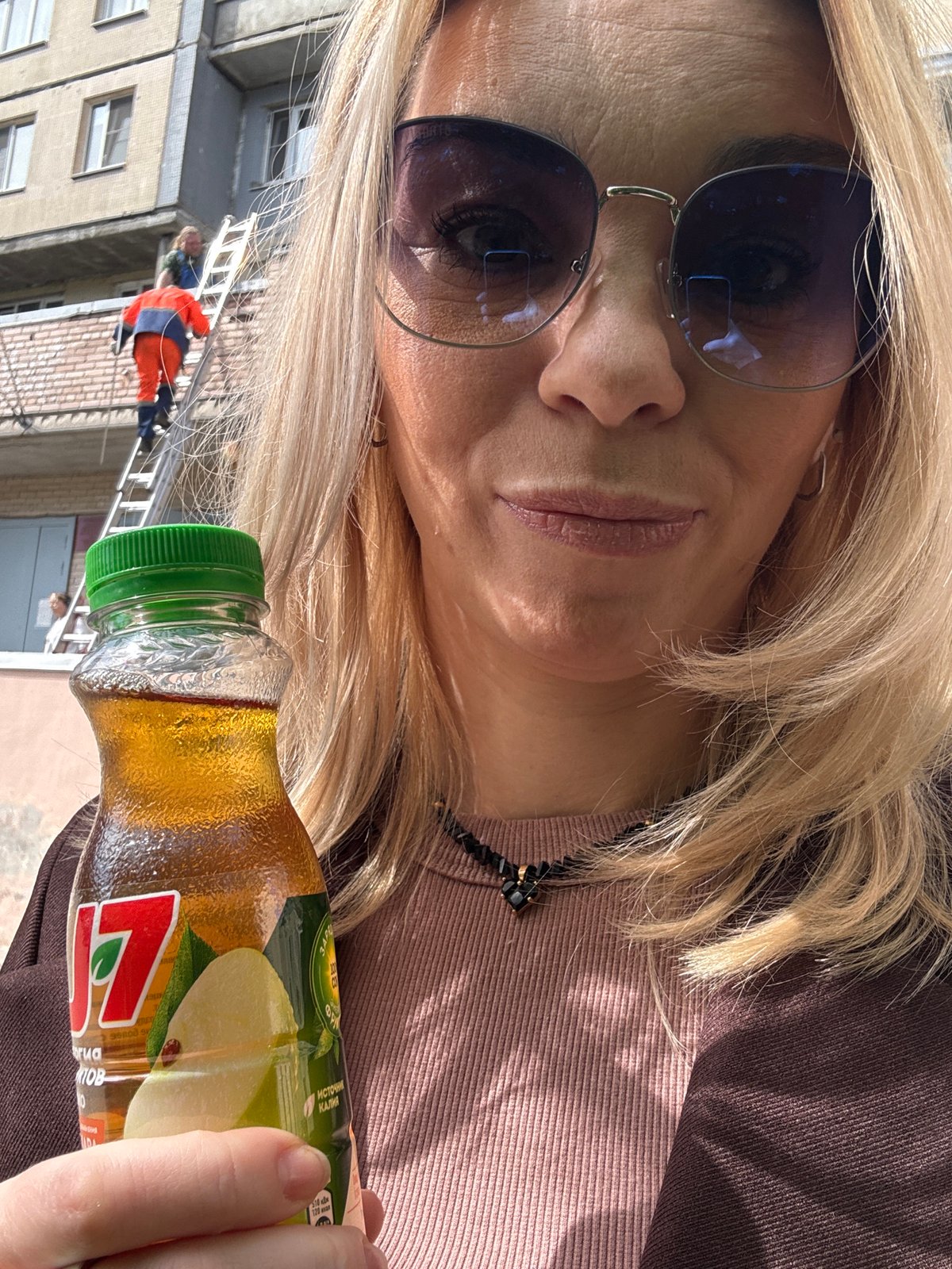 Woman films shopping trip near Saint Petersburg courthouse construction